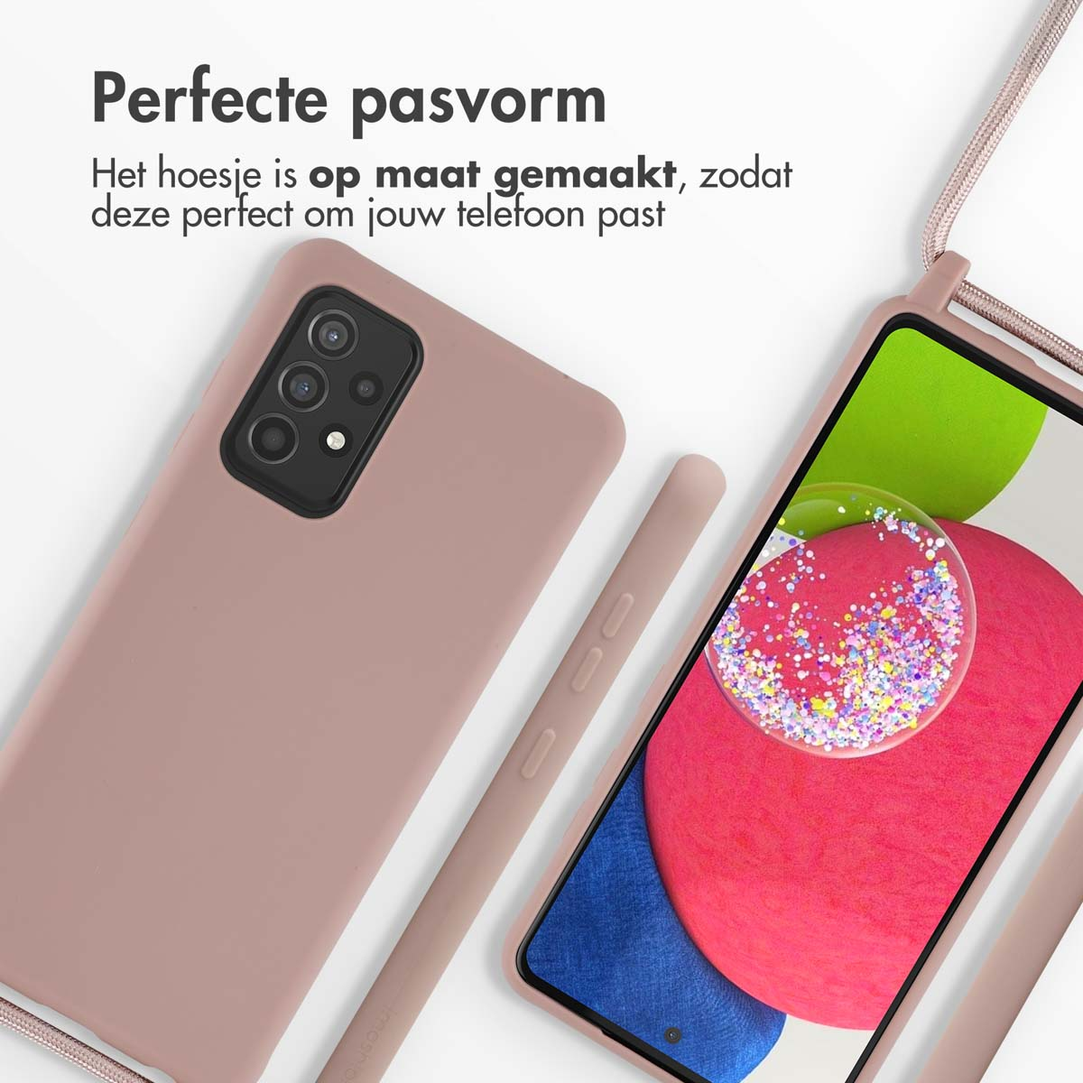 Deux téléphones et un stylet sur une surface blanche. Un téléphone a une coque rose et un cordon.