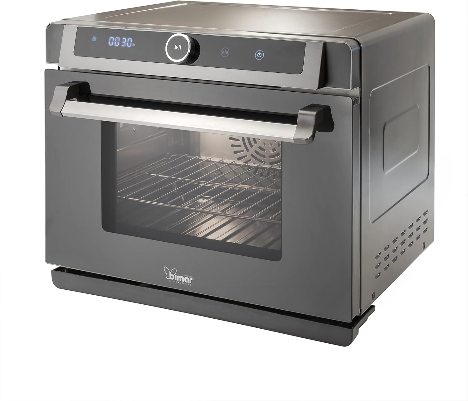 Horno con pantalla digital y asa de acero inoxidable. Una puerta de cristal revela el interior.