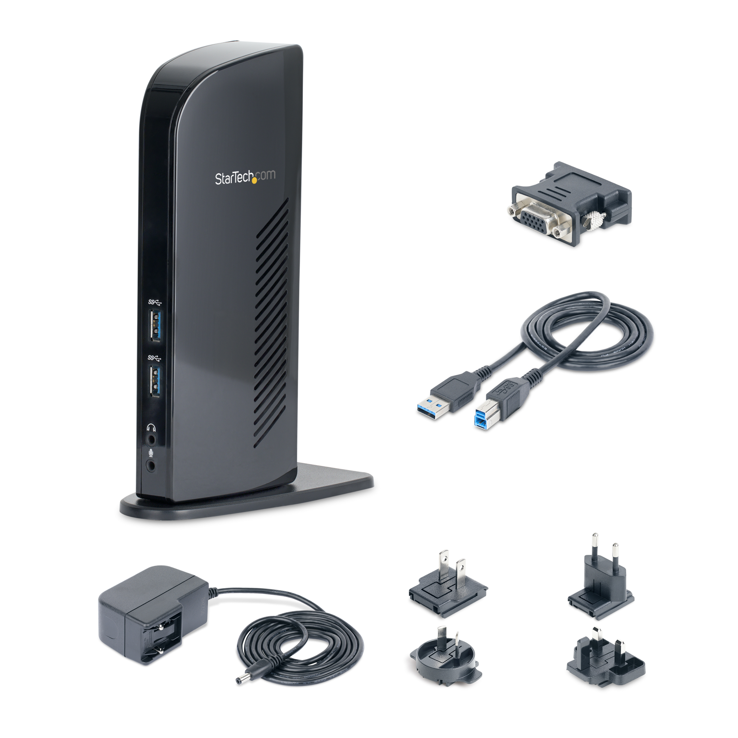 Base de conexión Startech negra con cables de alimentación y USB sobre fondo blanco.