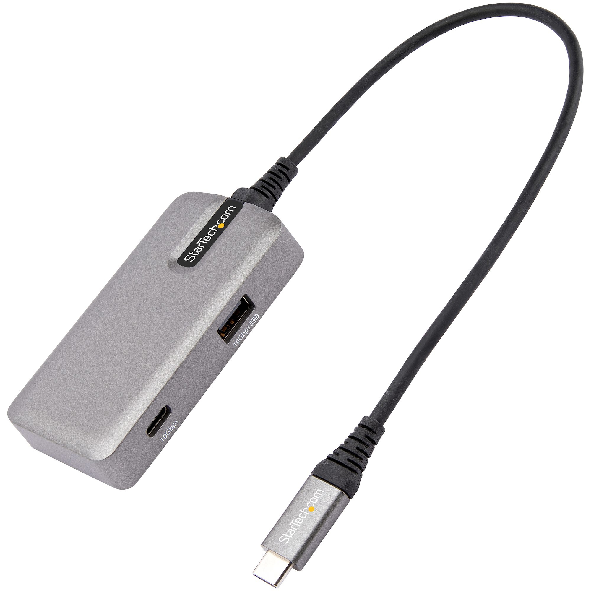 Adaptador USB-C StarTech gris con puertos USB y USB-C, conectado por cable.