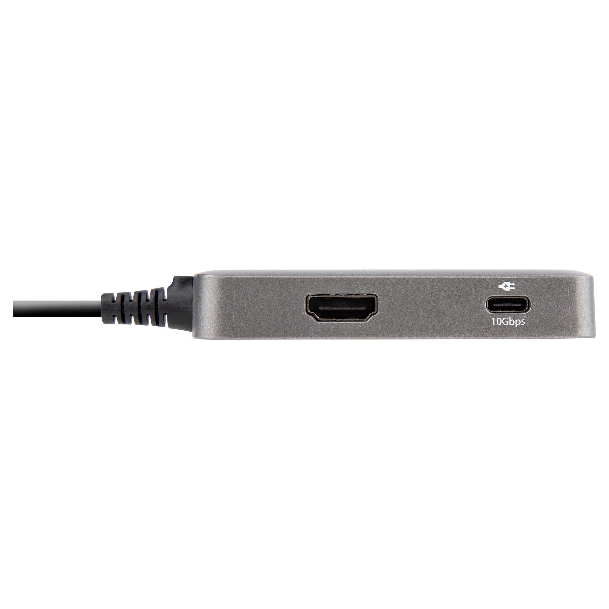 Hub gris con HDMI, USB-C y otros puertos. Cable negro se extiende desde el lado derecho.