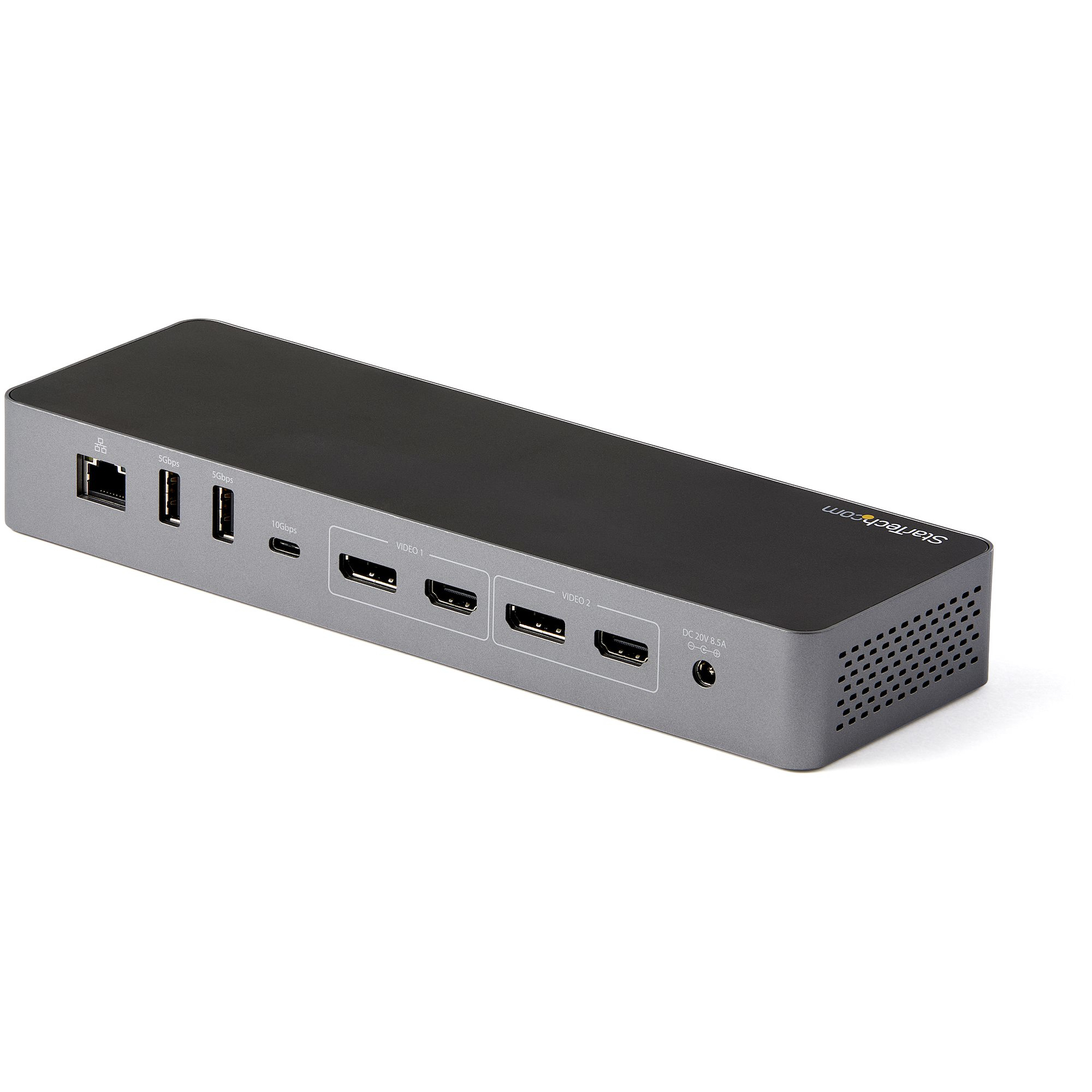Una docking station grigia con diverse porte, tra cui USB e HDMI, su una superficie bianca.