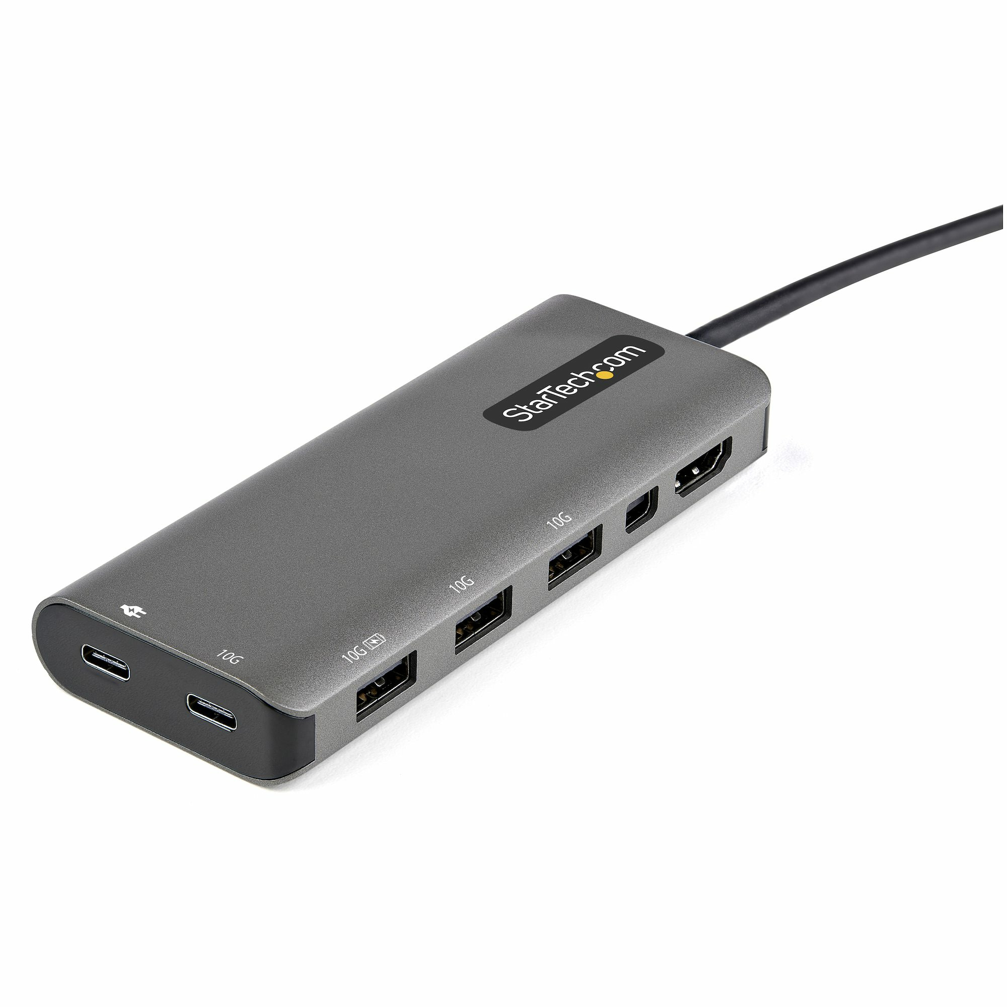 Un concentrador USB-C gris StarTech con múltiples puertos y un cable negro sobre fondo blanco.