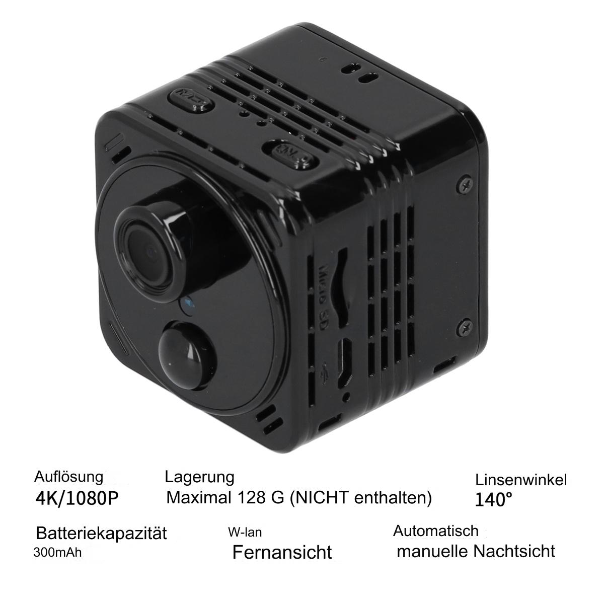 Schwarze, würfelförmige Kamera. Sie hat ein Objektiv, Knöpfe und Schlitze. Text auf Deutsch ist sichtbar.