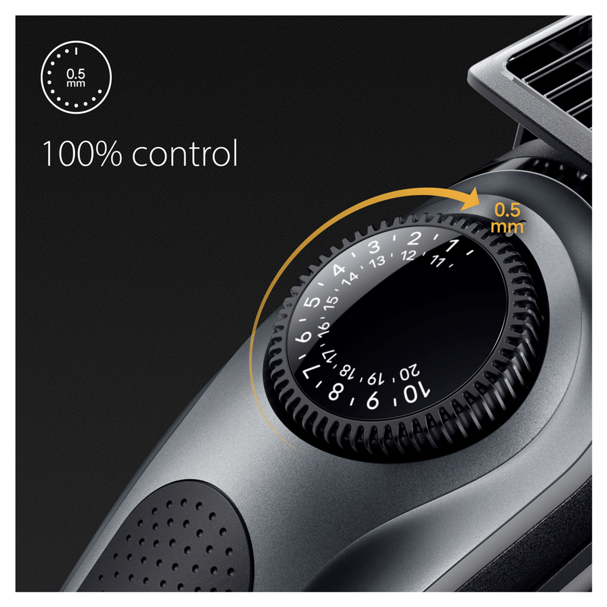 Primer plano de una afeitadora eléctrica negra y gris con un dial que muestra diferentes configuraciones de longitud.