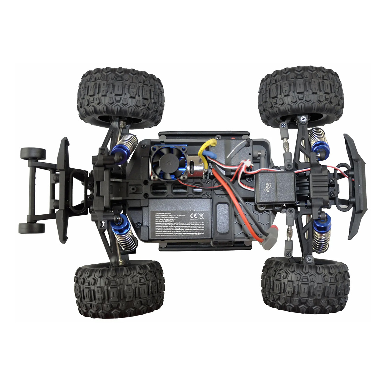 Vista superior del chasis de un coche RC negro con componentes y amortiguadores azules.