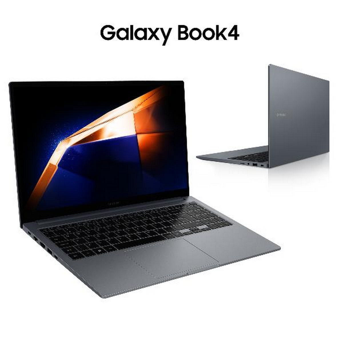 Un ordinateur portable gris sur une surface blanche.