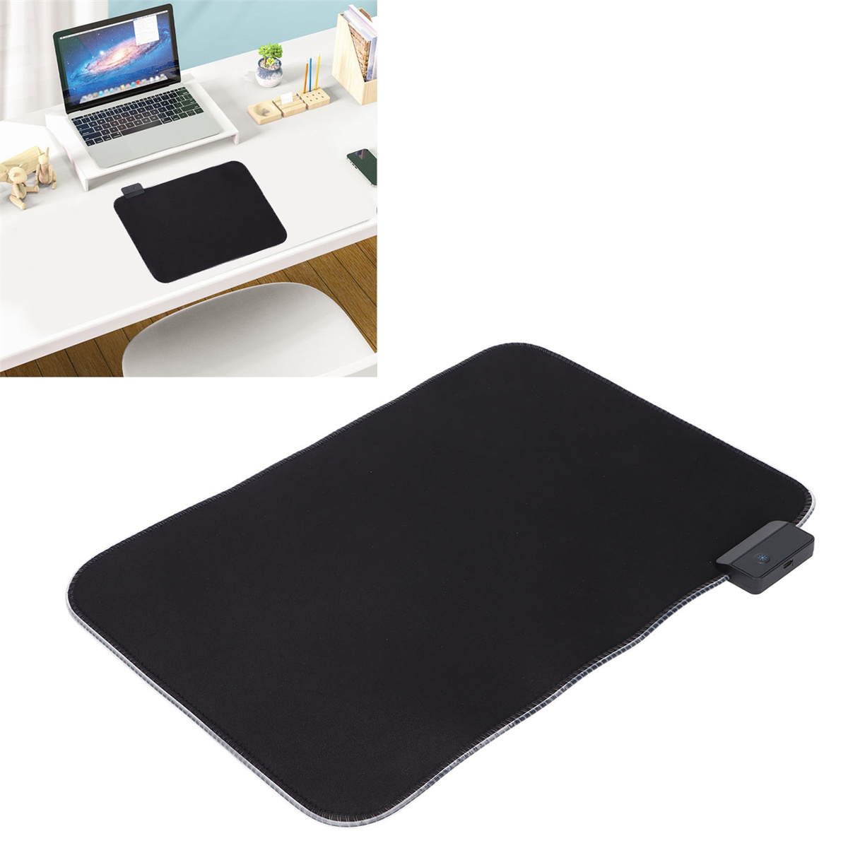 Schwarzes Mauspad auf einem weißen Schreibtisch mit einem Laptop. Ein kleines Bedienfeld ist sichtbar.