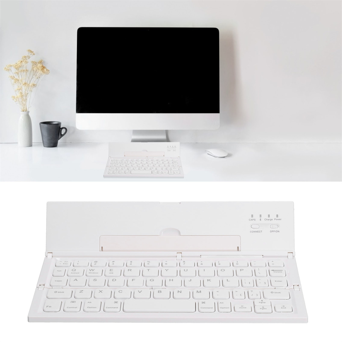Weiße Tastatur, Monitor und Maus auf weißem Schreibtisch. Tastatur ist geöffnet und verbunden. Hintergrund ist eine weiße Wand.