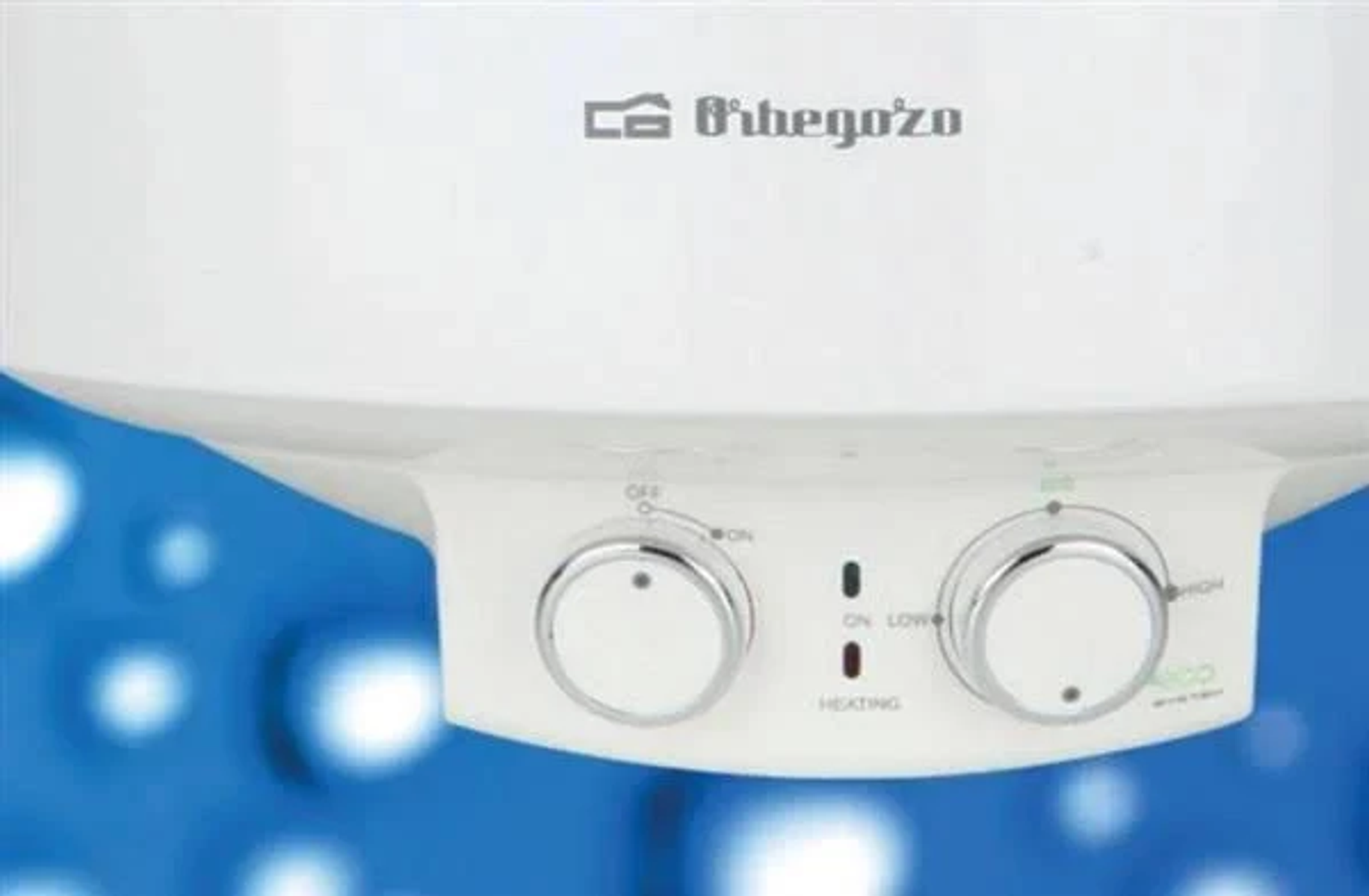 Un calentador de agua blanco con perillas para control de temperatura. La marca es 'Orbegozo'.