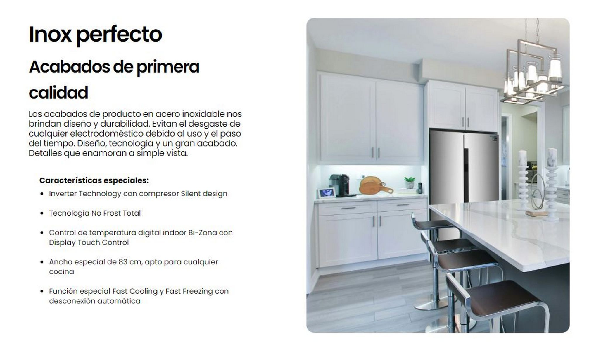 Una cocina moderna con armarios blancos, un refrigerador de acero inoxidable y una encimera de mármol.