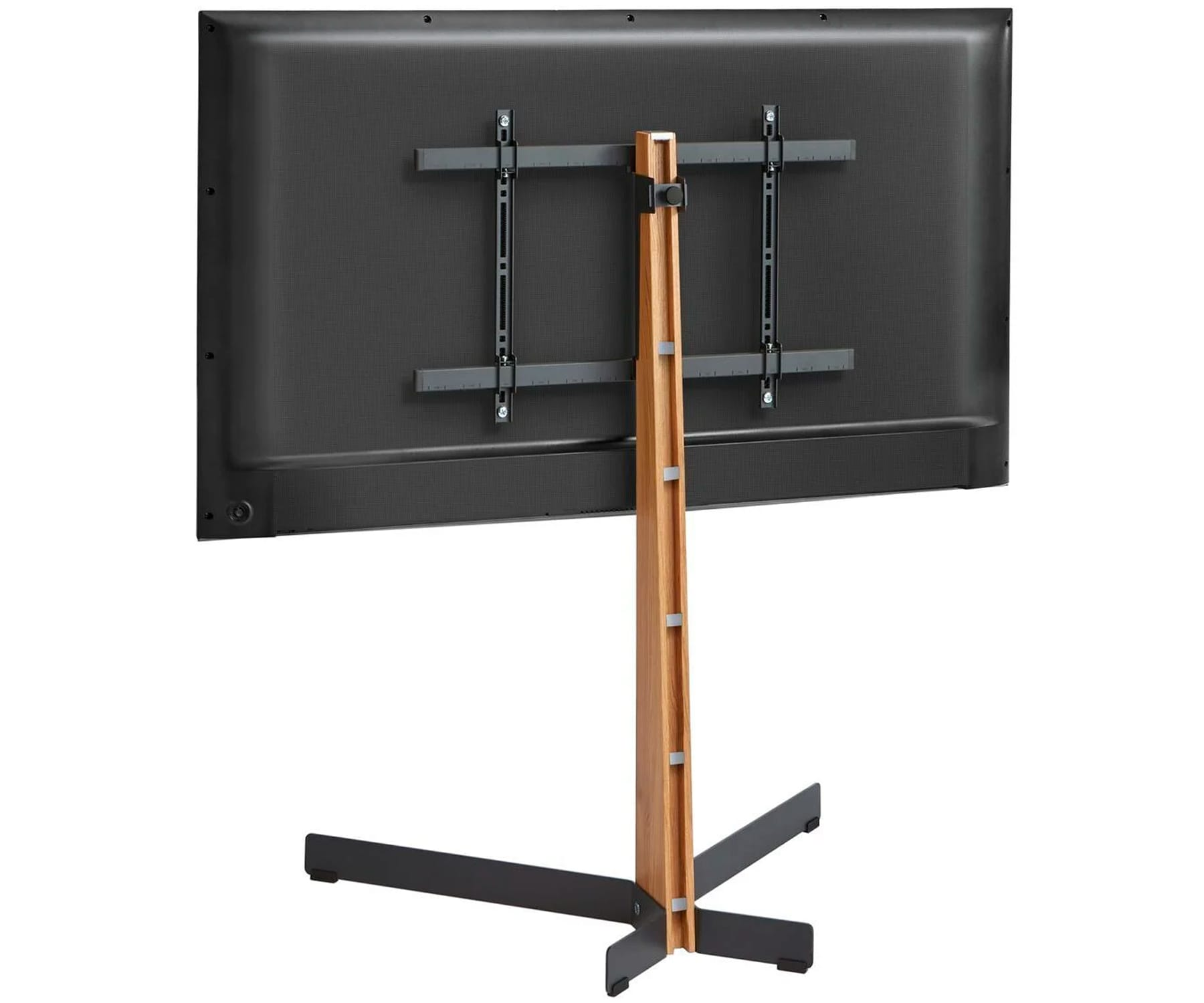 Stojak pod telewizor z telewizorem. Widoczny tył telewizora. Stojak jest drewniany.