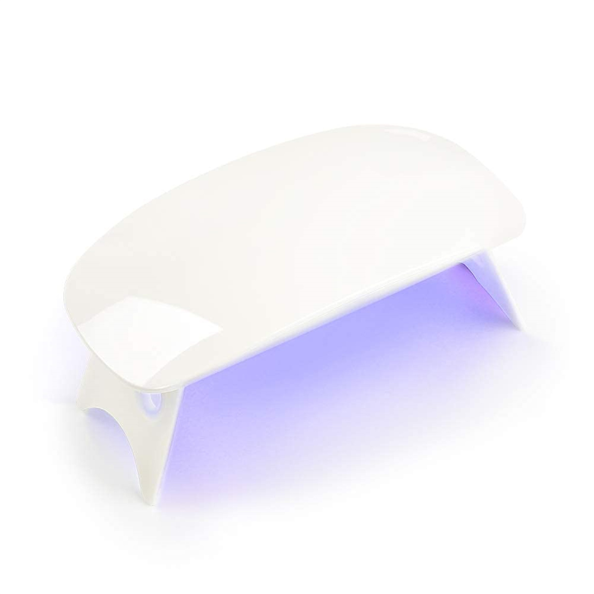 Weiße, gewölbte Nagellampe mit lila Licht im Inneren, auf einer weißen Oberfläche.