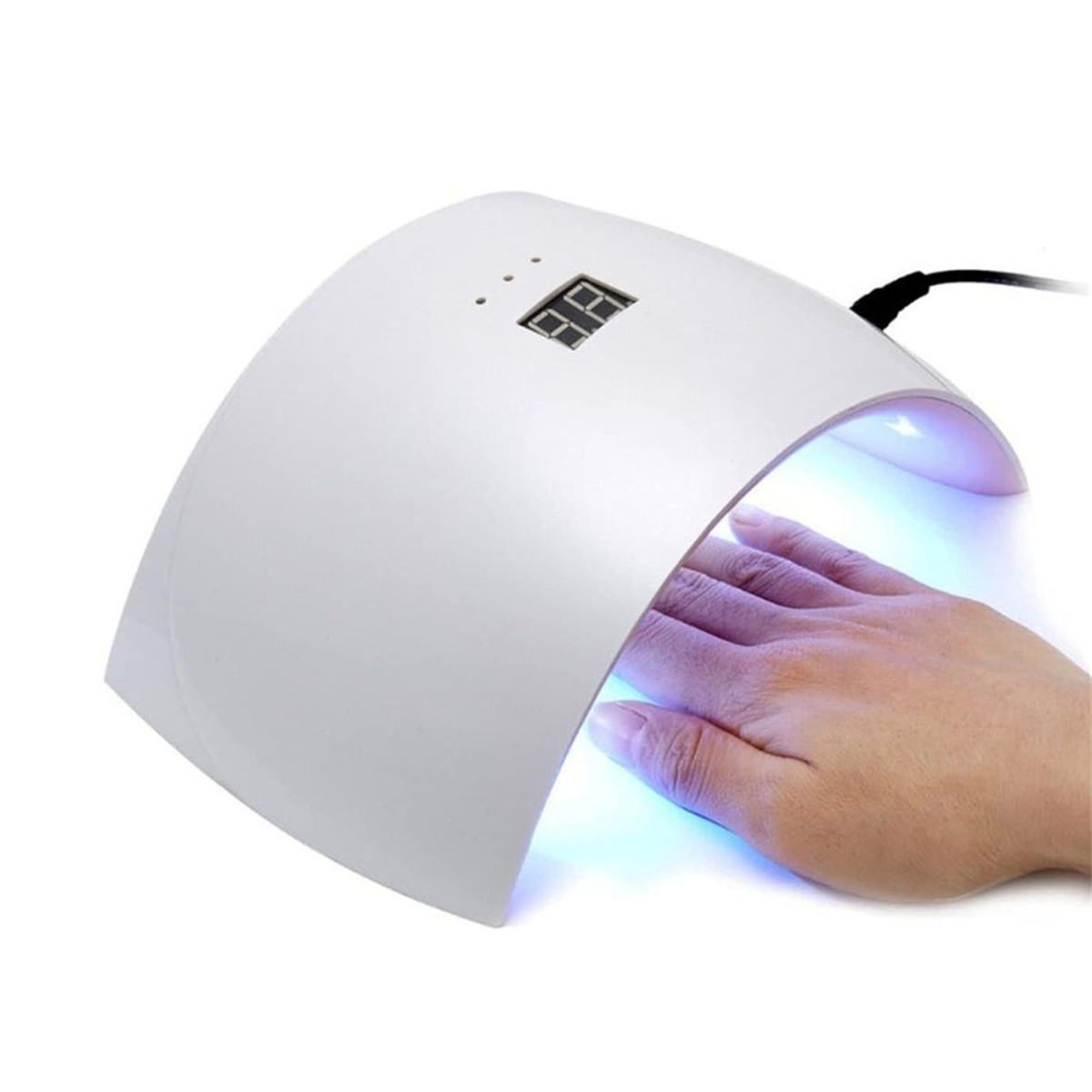 Eine weiße UV-Nagellampe mit einer Hand darin, die blaues Licht aussendet. Es gibt eine digitale Anzeige.