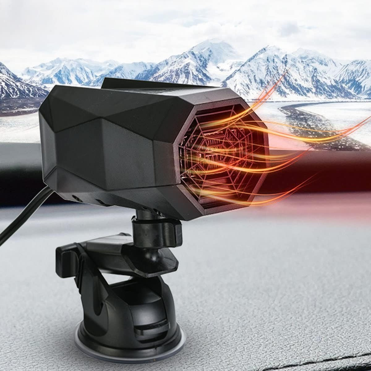 Schwarze Autoheizung auf einem Armaturenbrett, die einen orangen Luftstrom erzeugt, mit schneebedecktem Berg-Hintergrund.