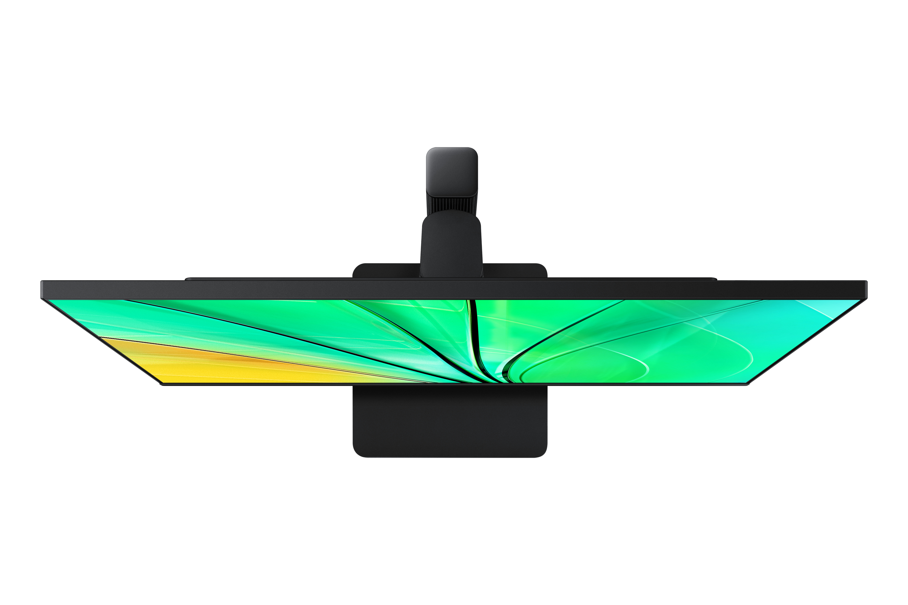 Czarny monitor z zielono-żółtym tłem na ekranie. Widok z góry. Czarna podstawka.