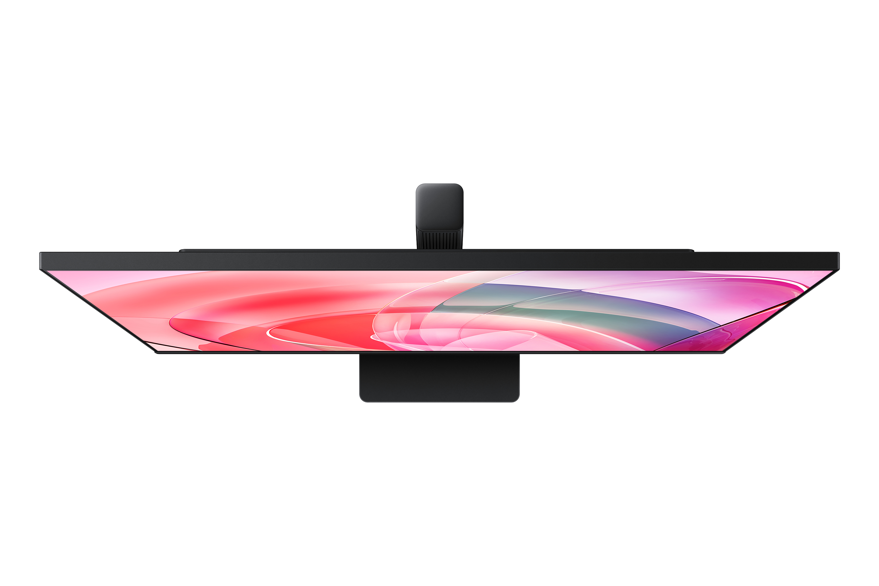 Widok z góry na monitor z czarną ramką i różowo-czerwonym wzorem na ekranie.