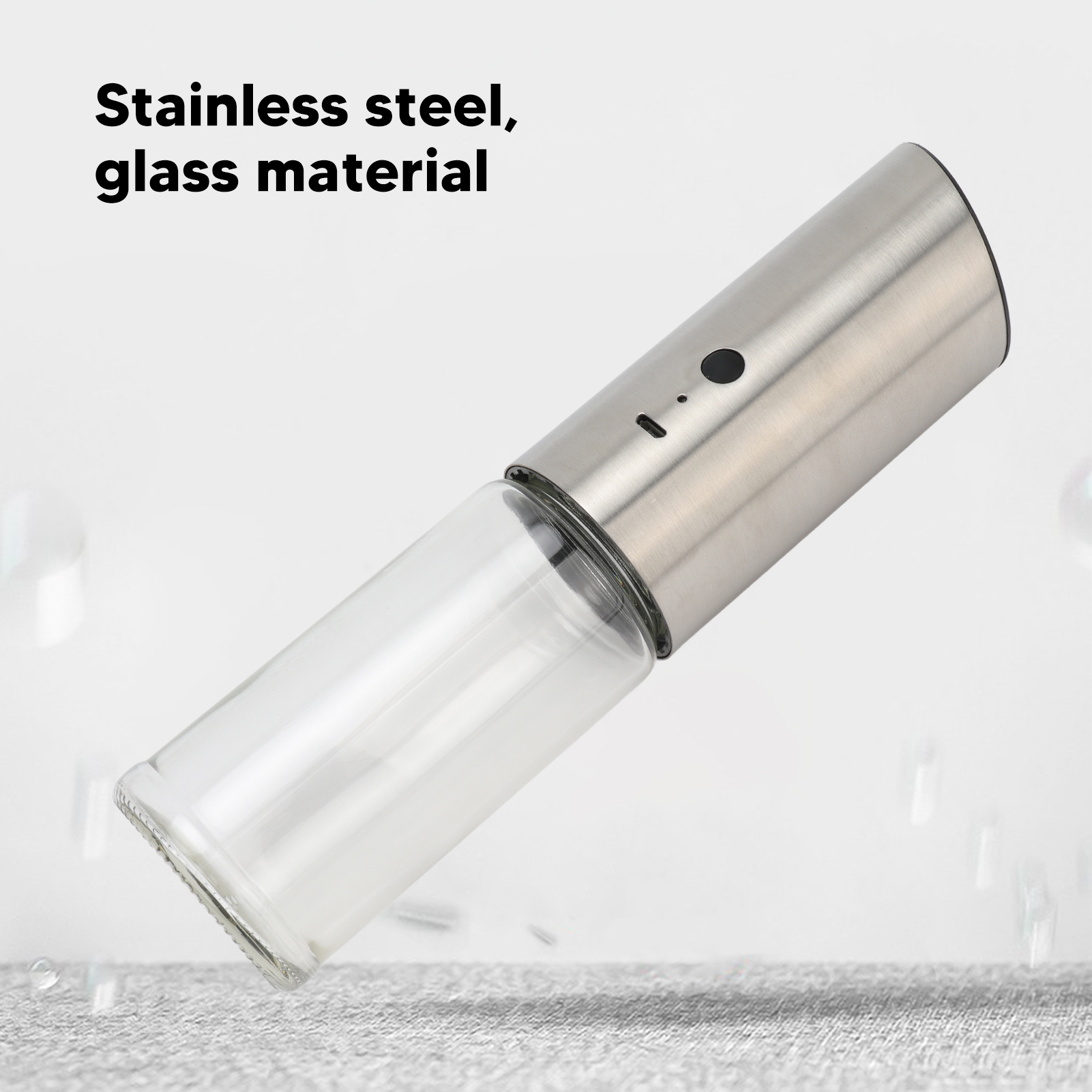 Silbernes und gläsernes Objekt. Edelstahl, Glasmaterial.
