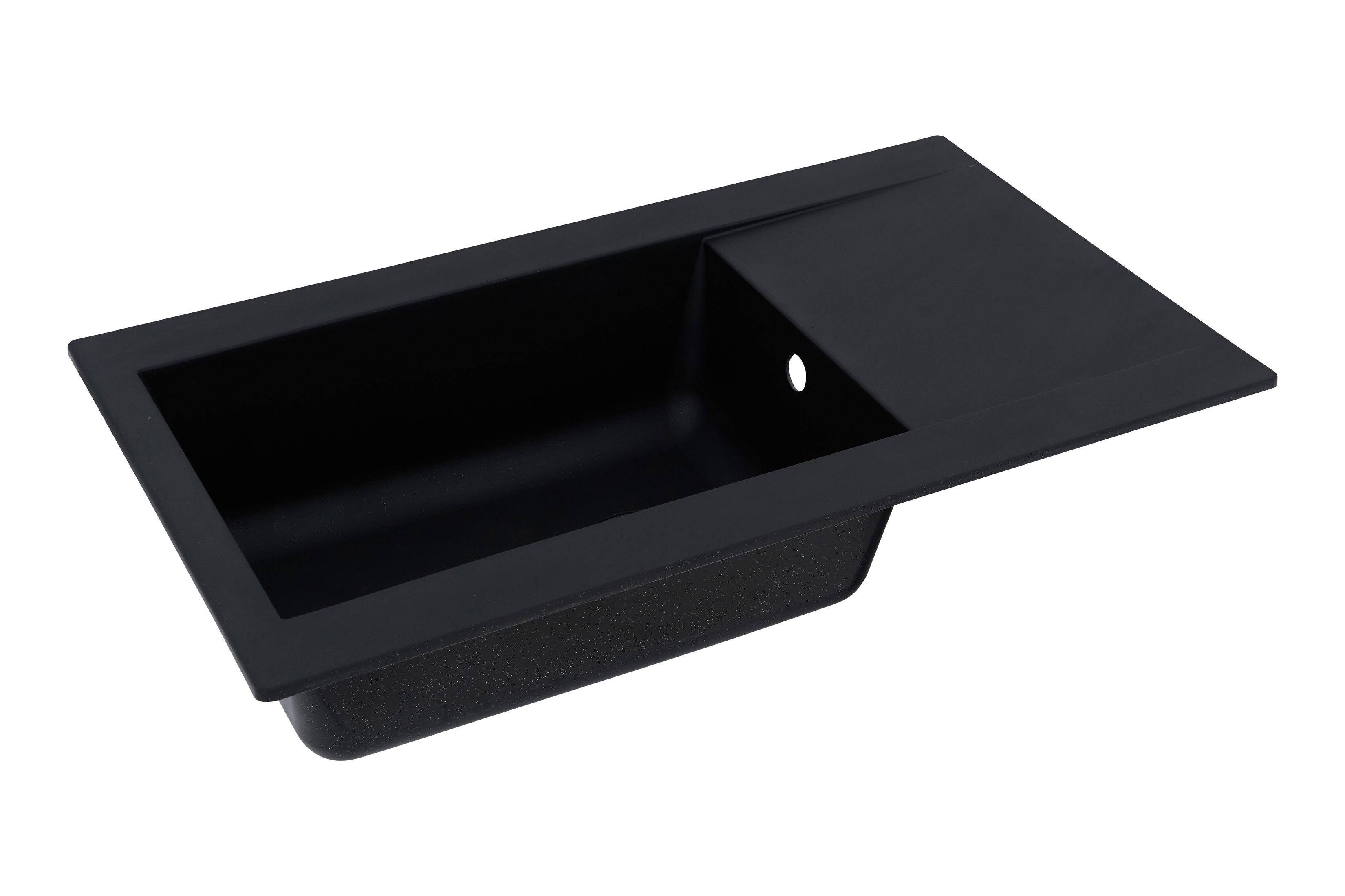 Schwarzes Küchenspülbecken mit einer kleinen Abtropffläche. Das Waschbecken hat ein rechteckiges Becken und eine glatte, gesprenkelte Oberfläche.