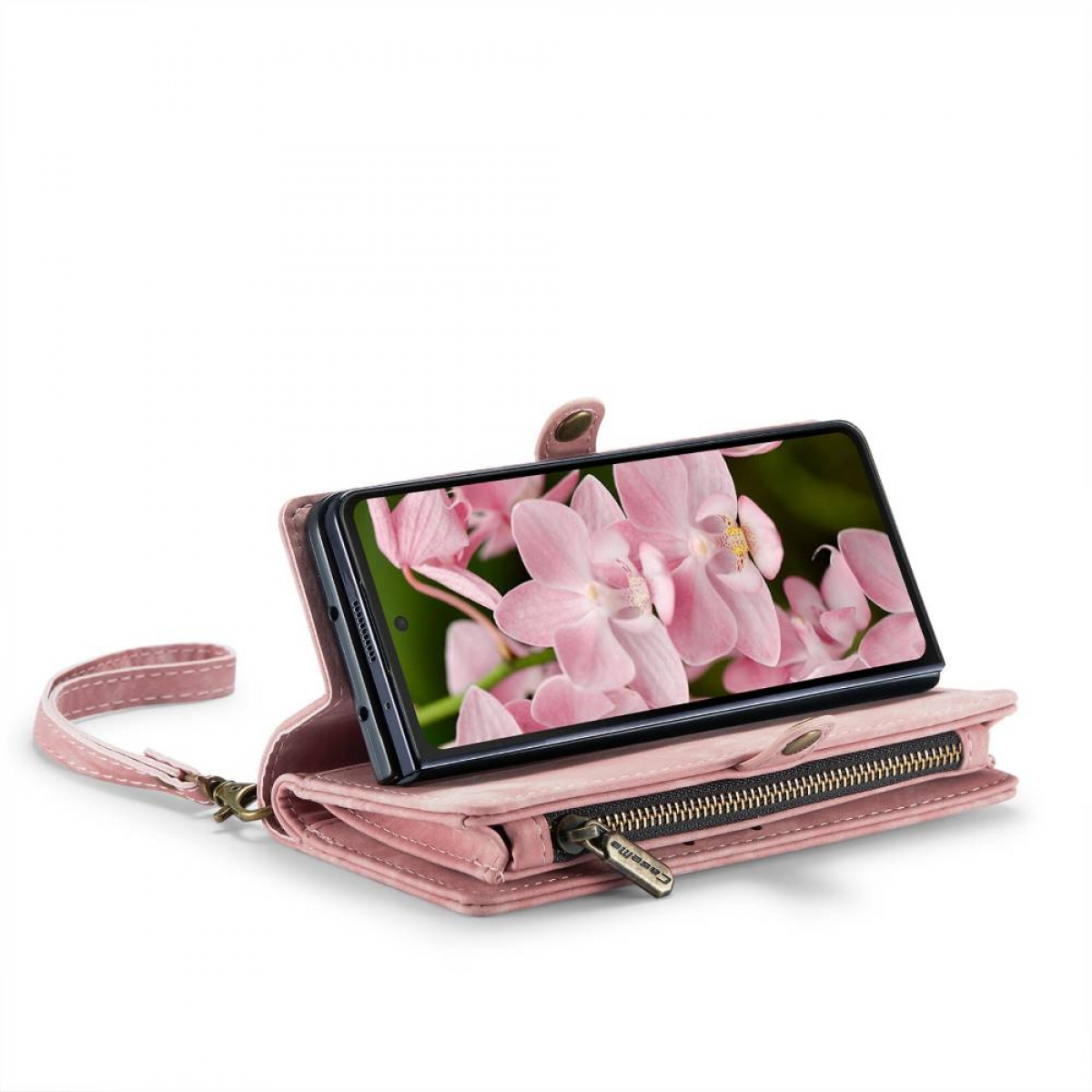 Rosa Telefontasche mit Telefon, geöffnet. Rosa Blumenhintergrund, Riemen.