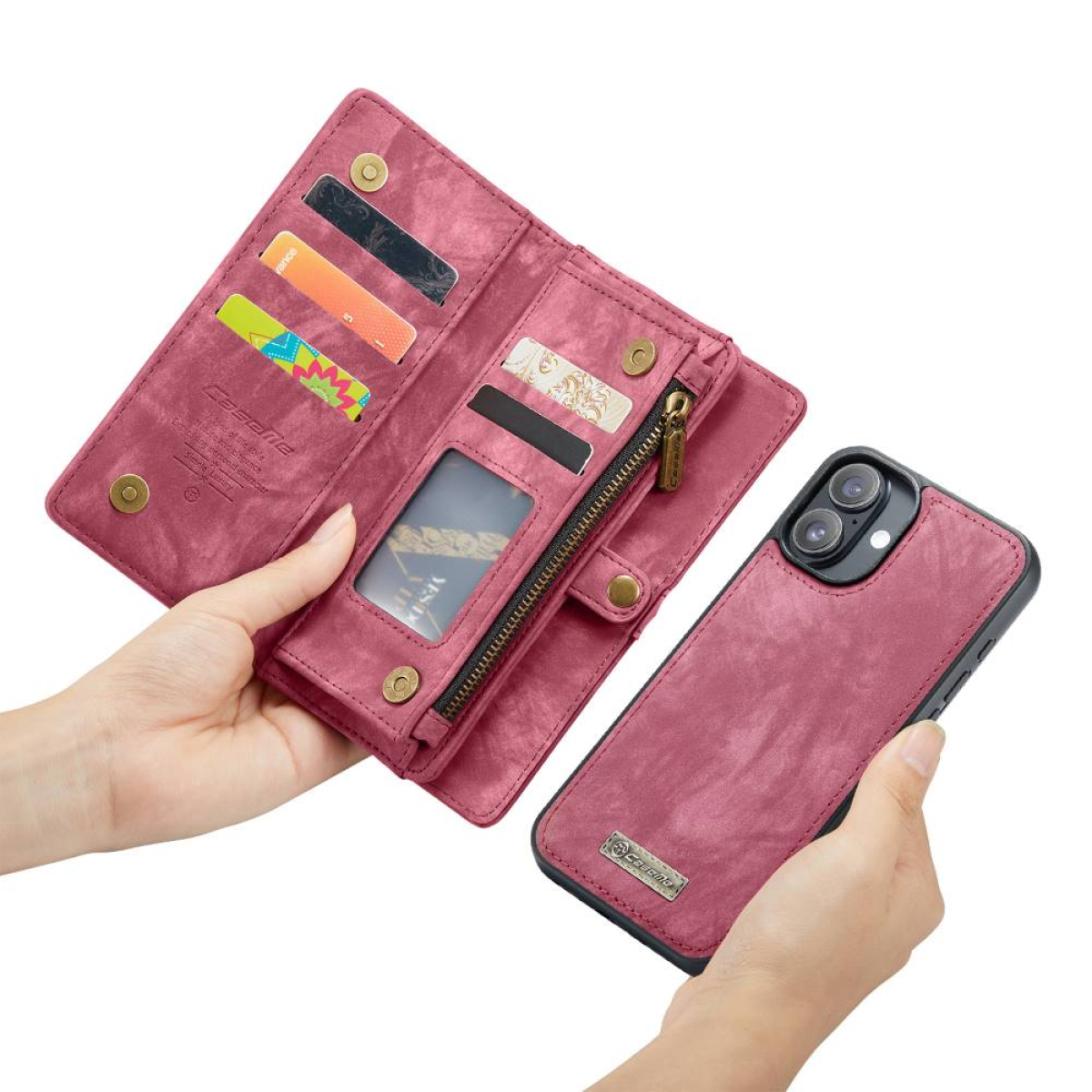 Eine pinkfarbene Brieftaschen-Handyhülle mit Karten und einem Telefon. Eine Frau hält sie.