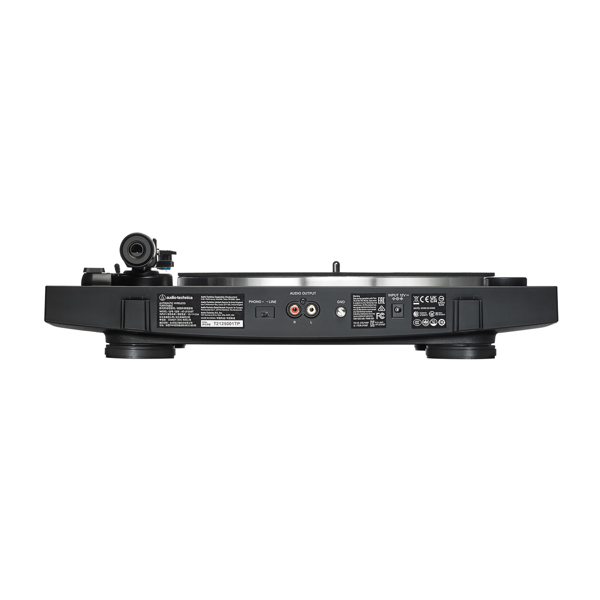 Vista trasera de un tocadiscos negro con varios puertos de conexión y etiquetas.
