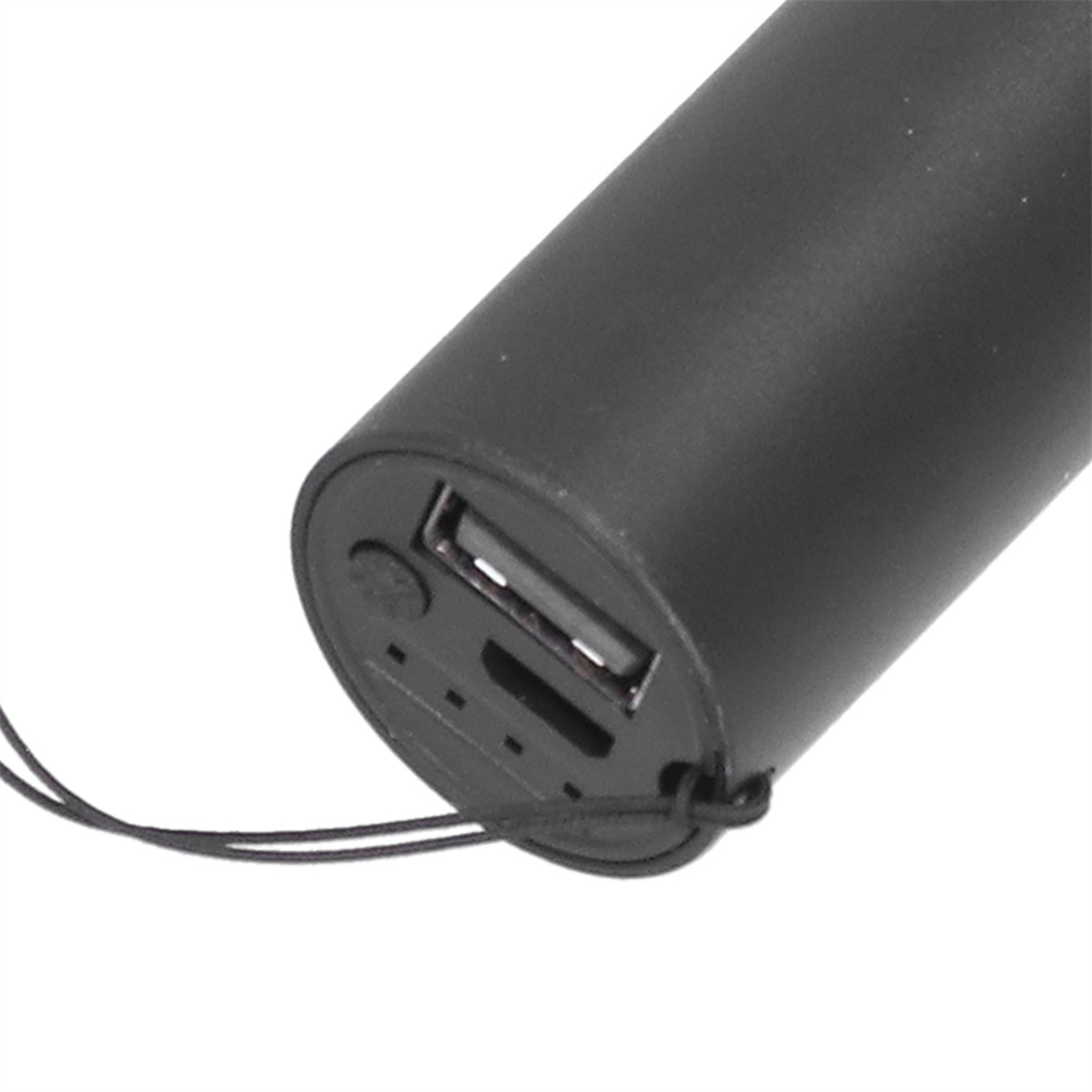 Ein schwarzes zylindrisches Gerät mit USB- und anderen Anschlüssen.