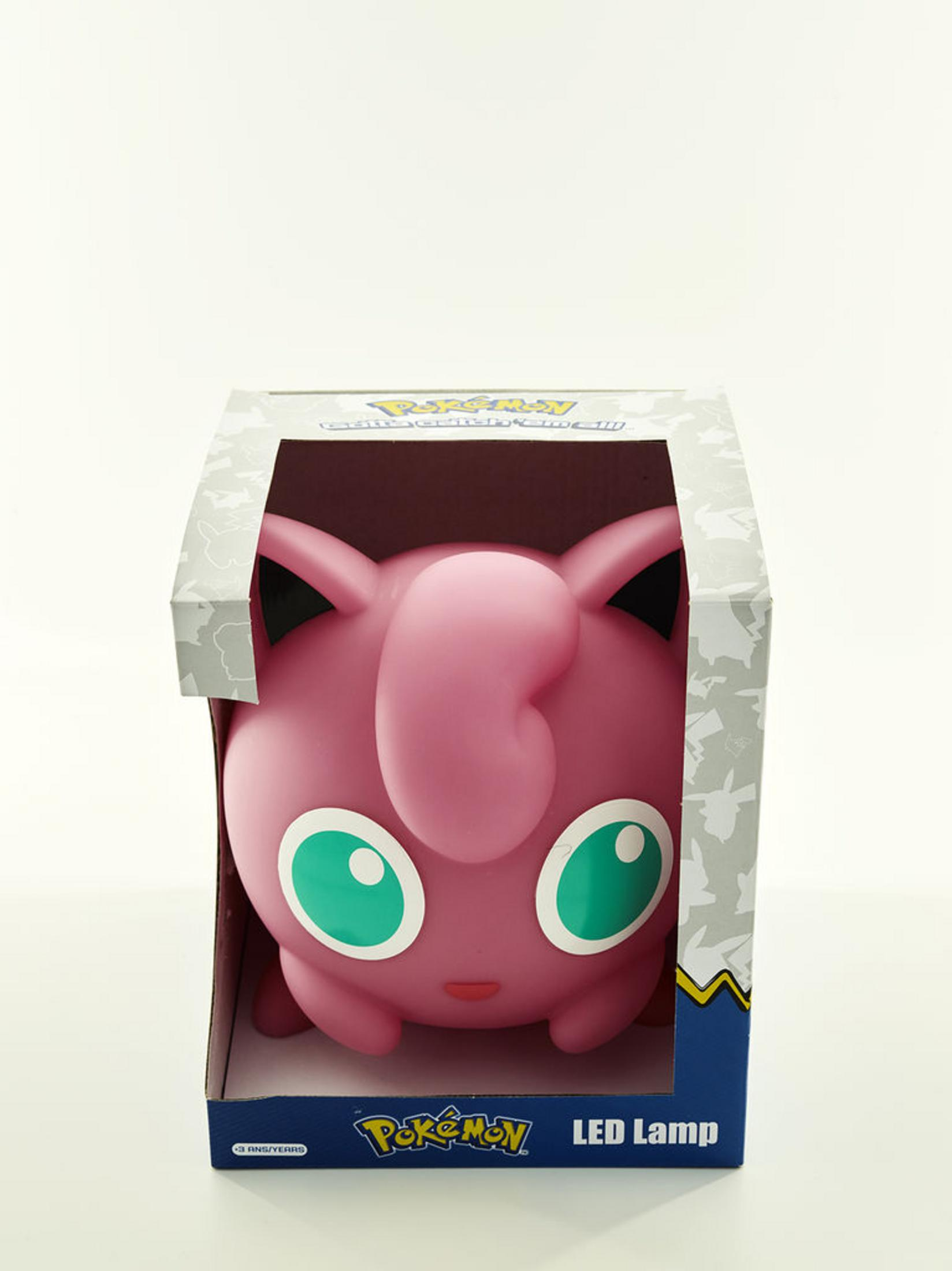Una lampada LED Jigglypuff rosa in una scatola di cartone.