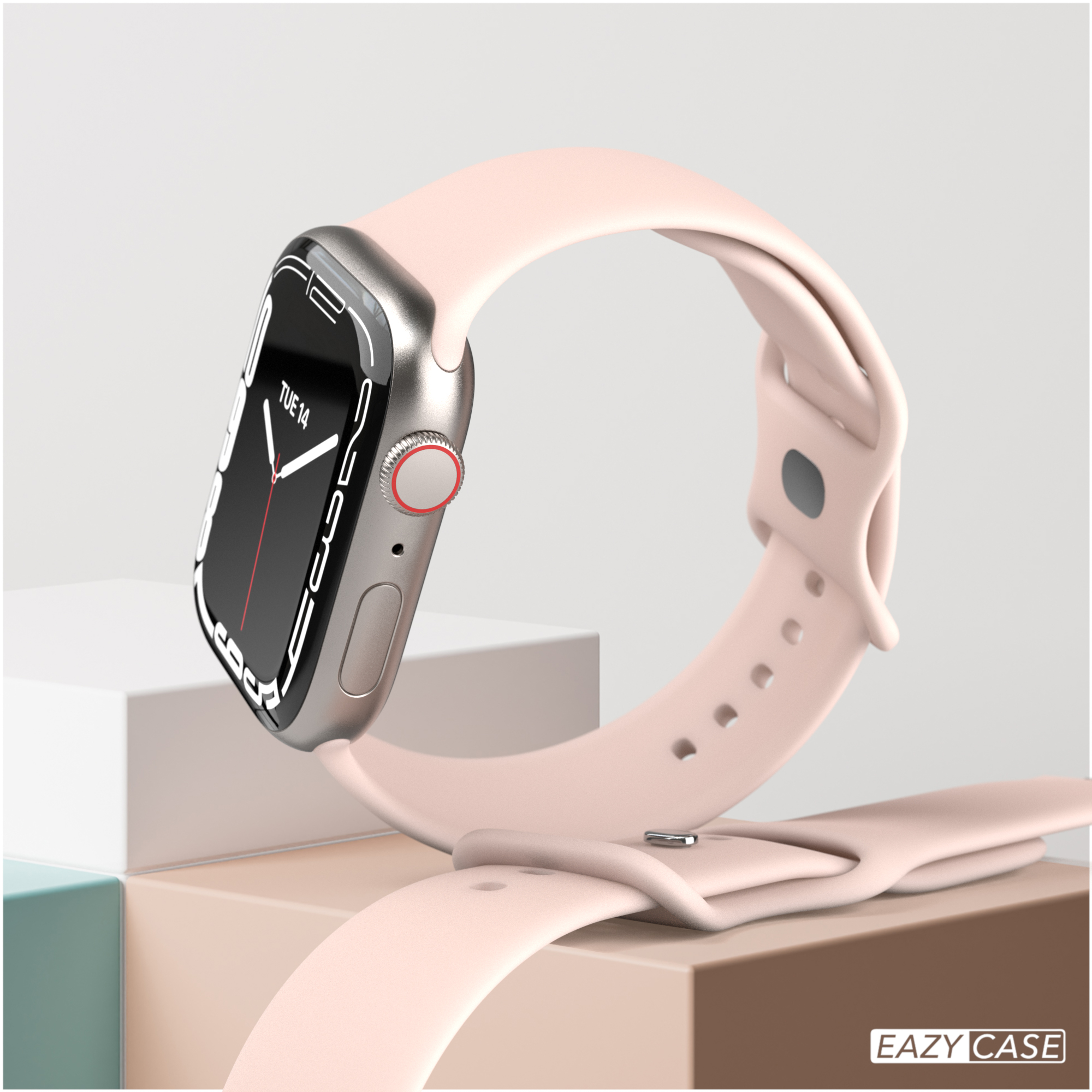 Eine rosa Uhr mit silbernem Gehäuse und rosa Armband. Die Uhr steht auf einem Ständer.