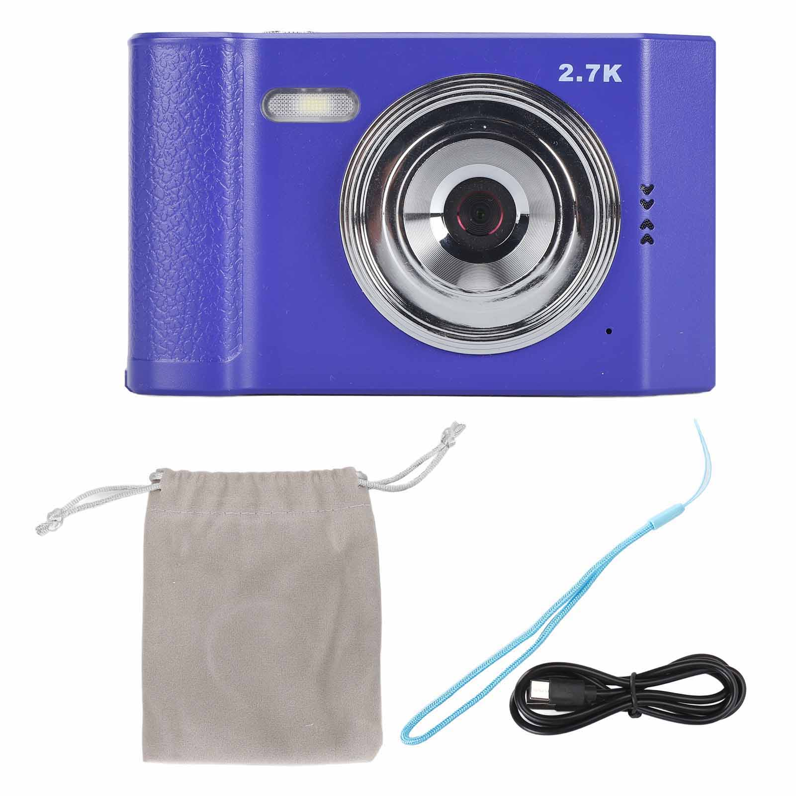 Eine blaue Kamera mit silbernem Objektiv, Zubehör umfasst eine graue Tasche, einen Riemen und ein Kabel.