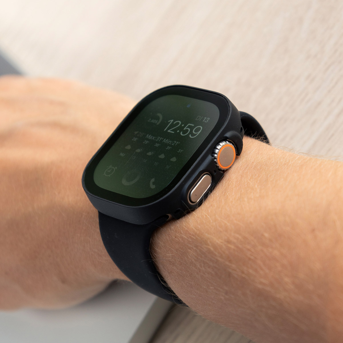 A person's wrist with a smartwatch that displays the time and health data.