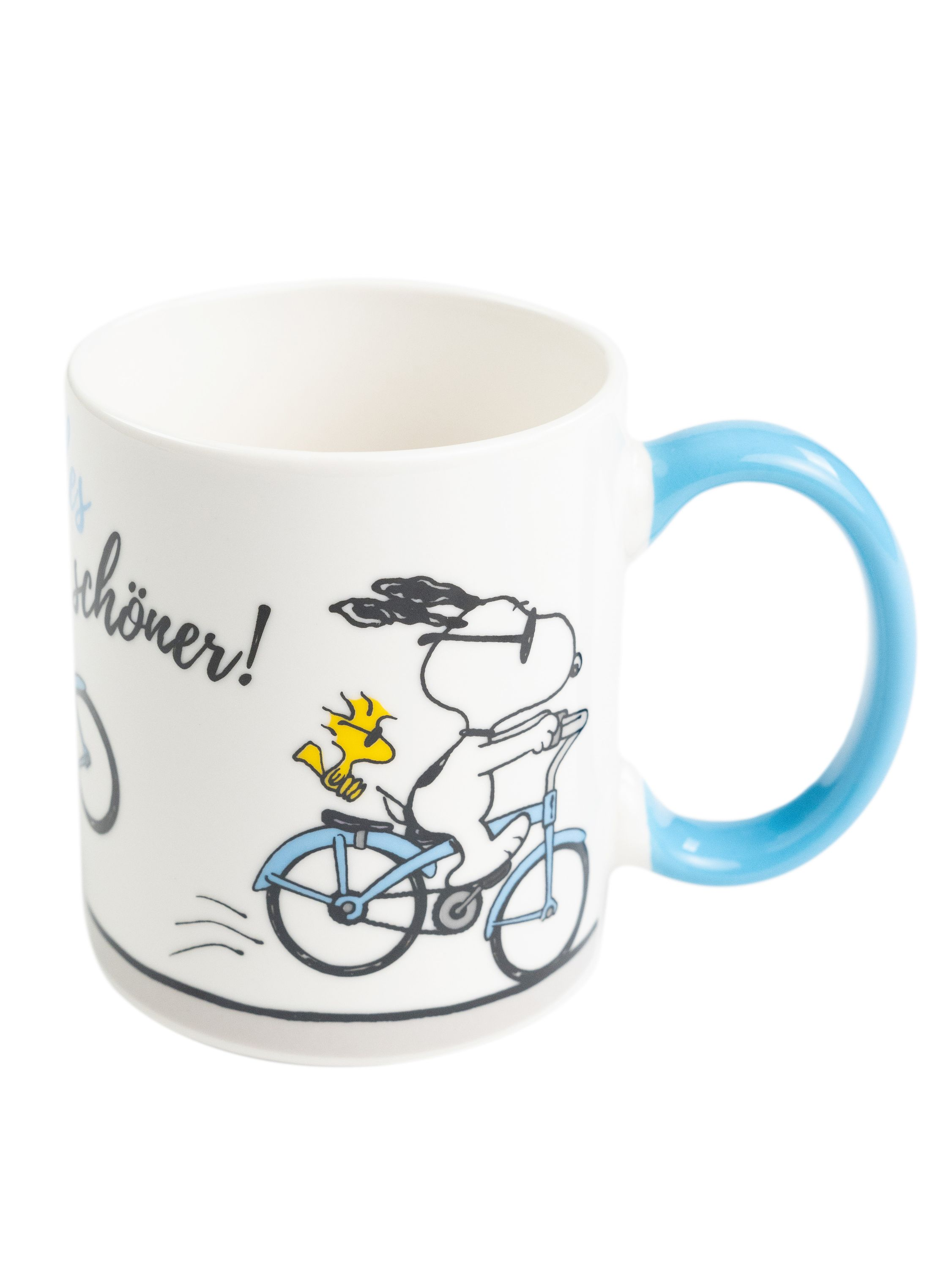 Weißer Becher mit Snoopy auf einem Fahrrad, Woodstock und blauem Henkel. Text: Es ist ein schöner Tag.
