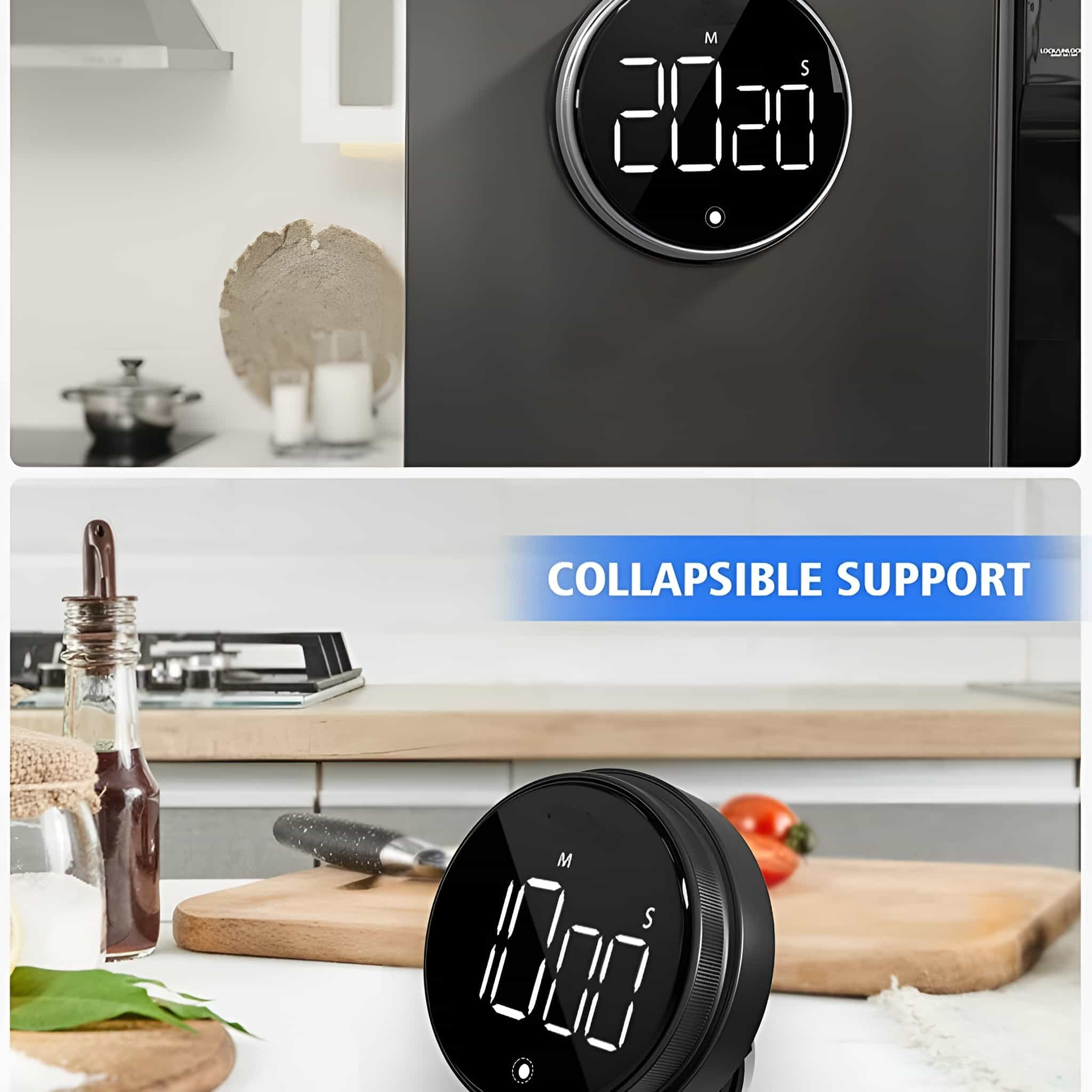 Ein digitaler Timer zeigt 20:20. Er ist schwarz mit silbernem Rand, auf schwarzer Oberfläche. Ein weiterer Timer liegt auf dem Tisch.