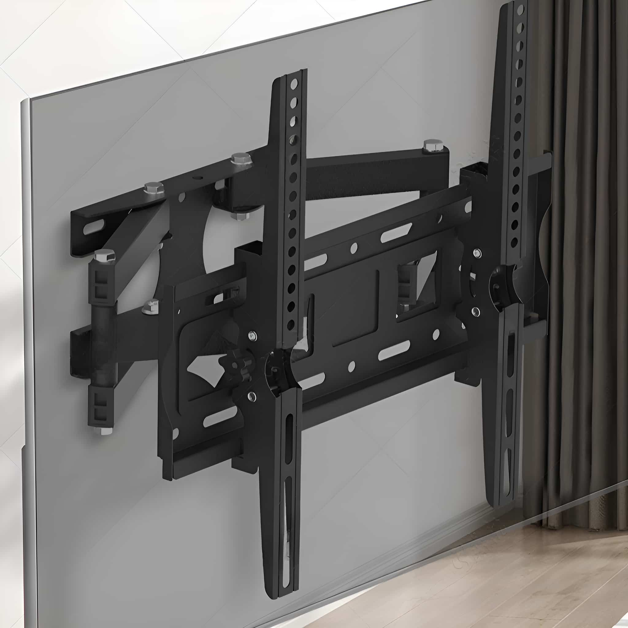 Schwarze TV-Wandhalterung an einer grauen Wand montiert. Horizontal, mit Metallrahmen.