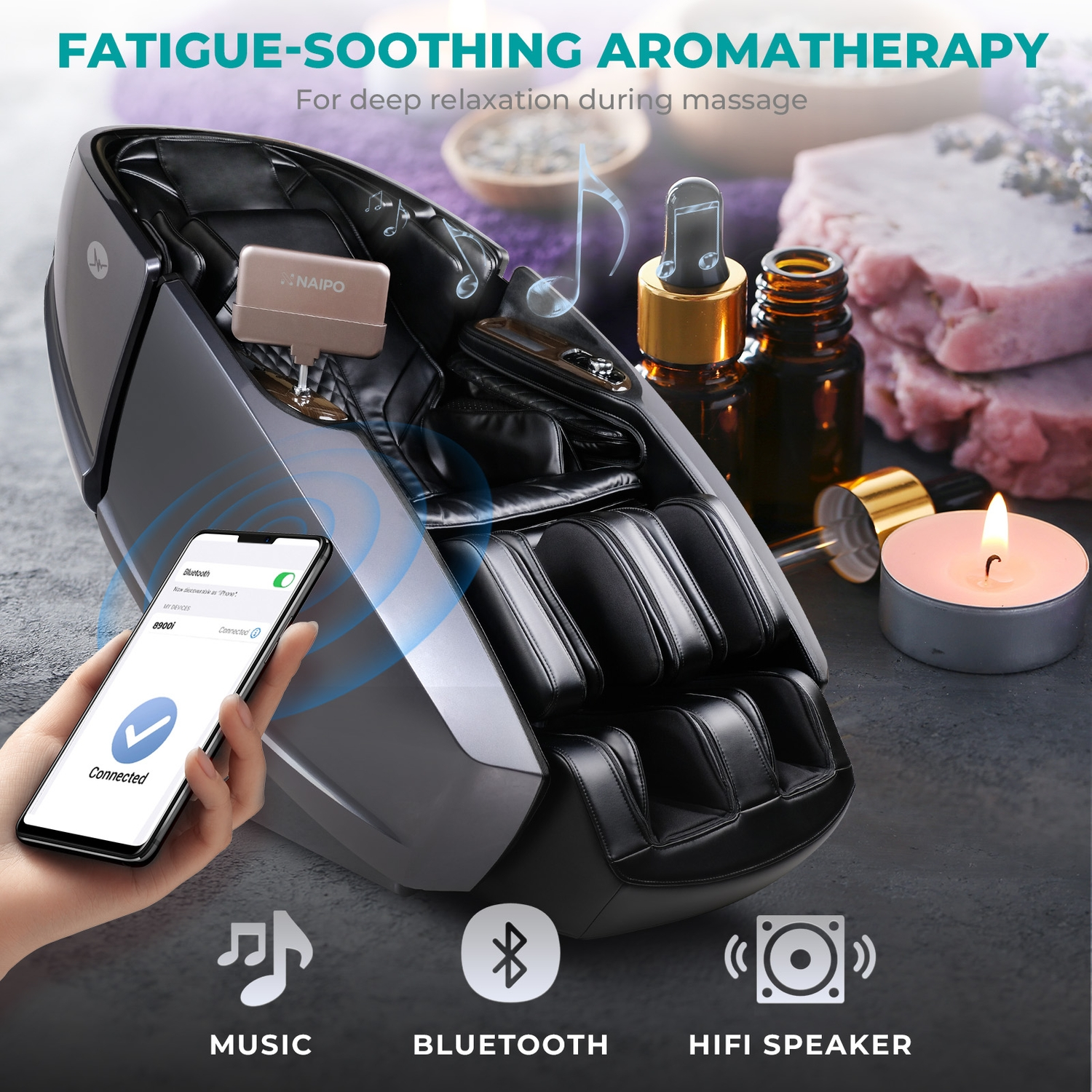 Massagesessel mit Telefon, Kerze und Aromatherapie-Artikeln.