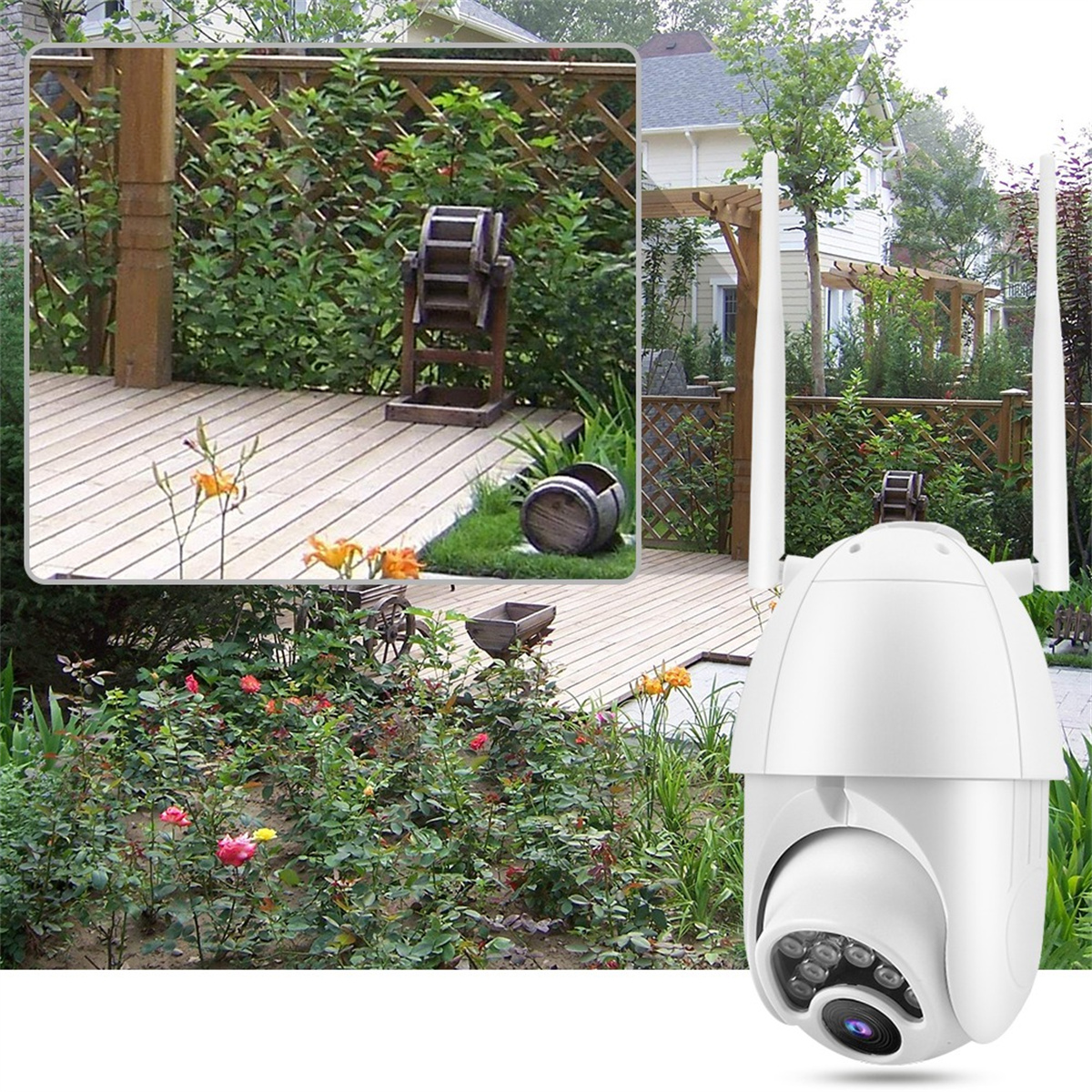 Eine weiße Überwachungskamera mit zwei Antennen, mit Garten und Zaun im Hintergrund.