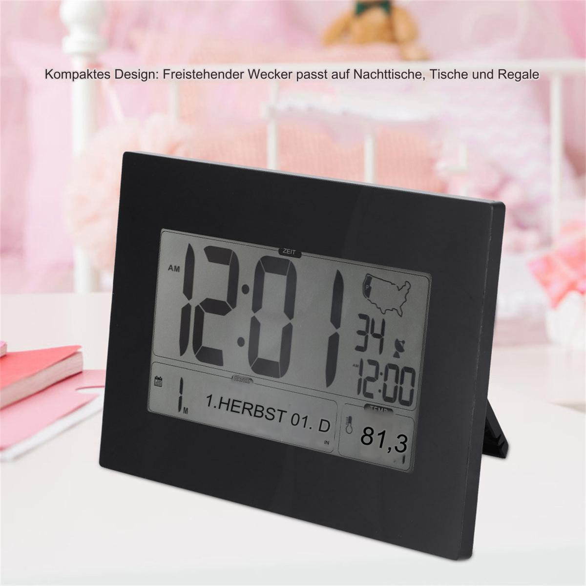 Schwarze Digitaluhr mit großen Ziffern. Zeigt Zeit und Datum an. Rosa Hintergrund.