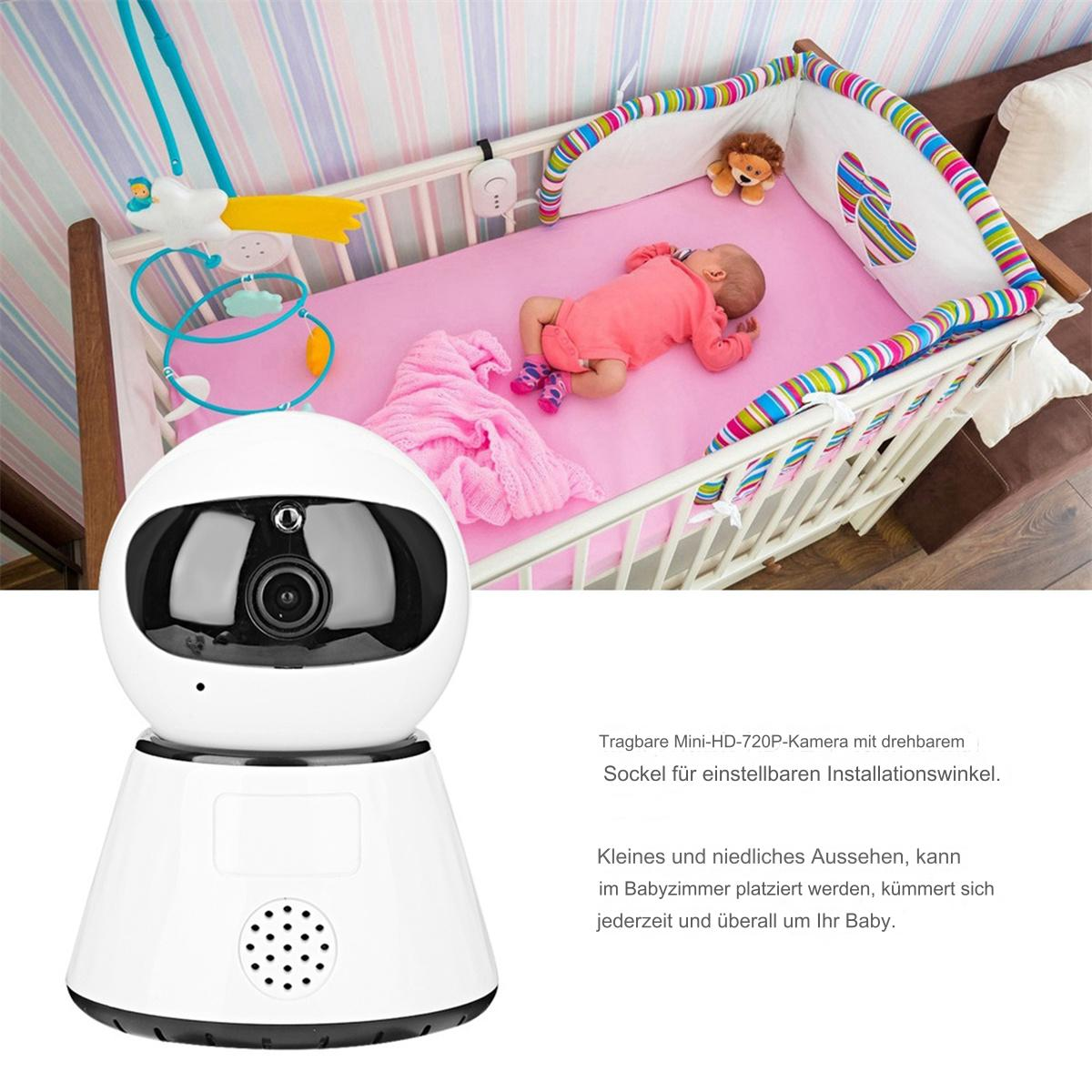 Babyphone auf weißer Basis, mit Baby im Kinderbett. Rosa Decke, Spielzeug und Monitor sind sichtbar.