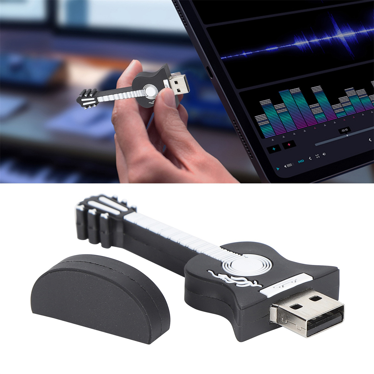 Gitarrenförmiger USB-Stick, schwarz mit weißen Details. Eine Hand hält ihn in der Nähe eines Tablets.