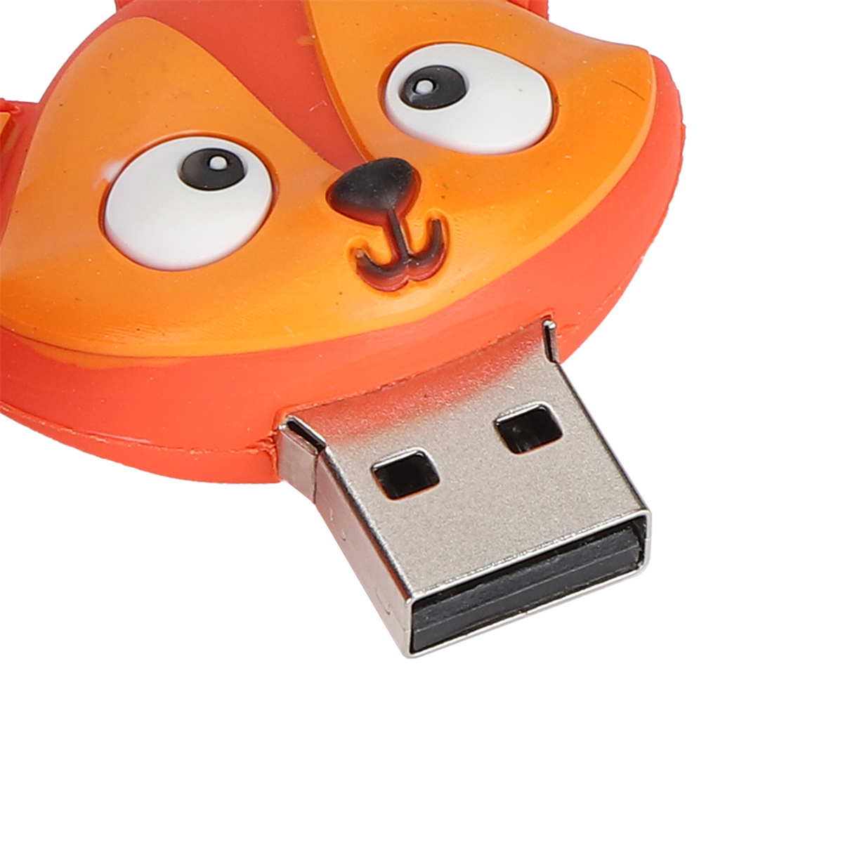 USB-Stick in Form eines Cartoon-Fuchskopfes, orange und weiß.