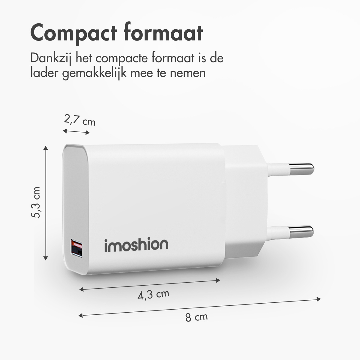 A white charger with dimensions labeled. Text describes its compact size.