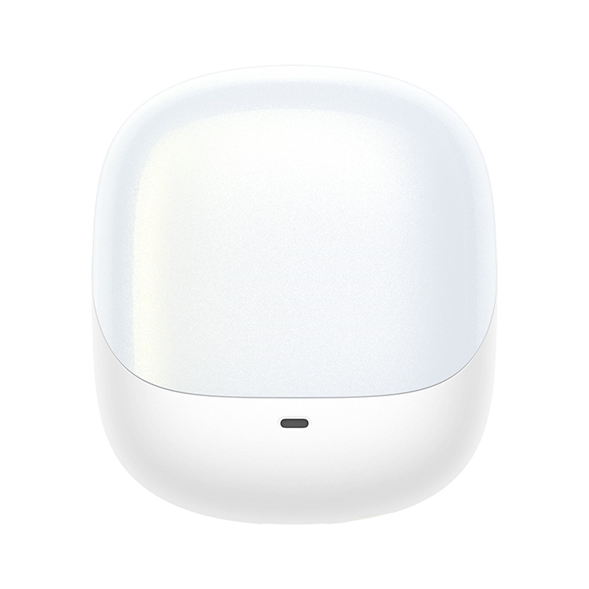 Biała, zaokrąglona lampka nocna. Ma gładką, jasną powierzchnię i mały, ciemny przycisk na dole.