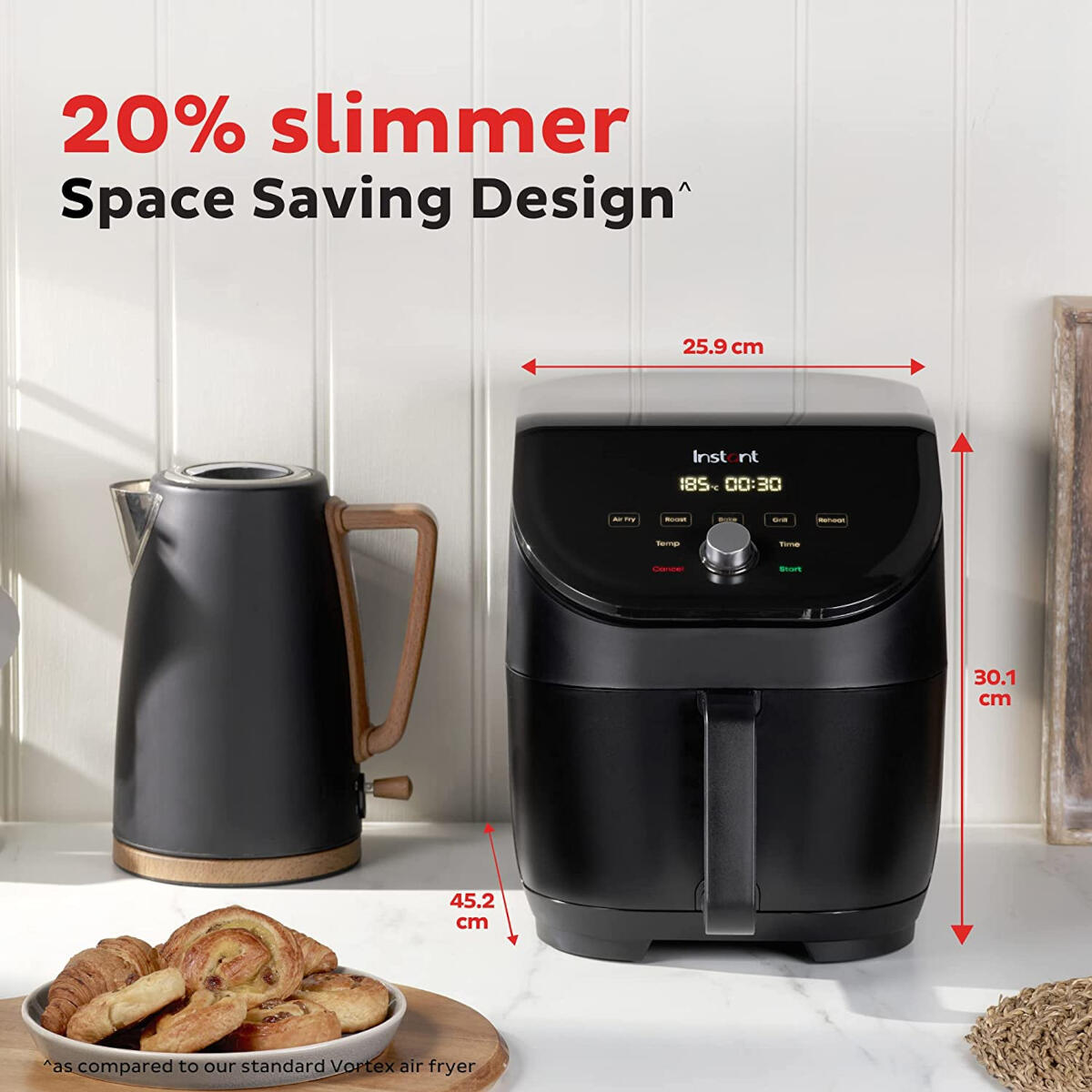 Black air fryer and kettle. Dimensions are shown with labels. Text says 20% slimmer design.