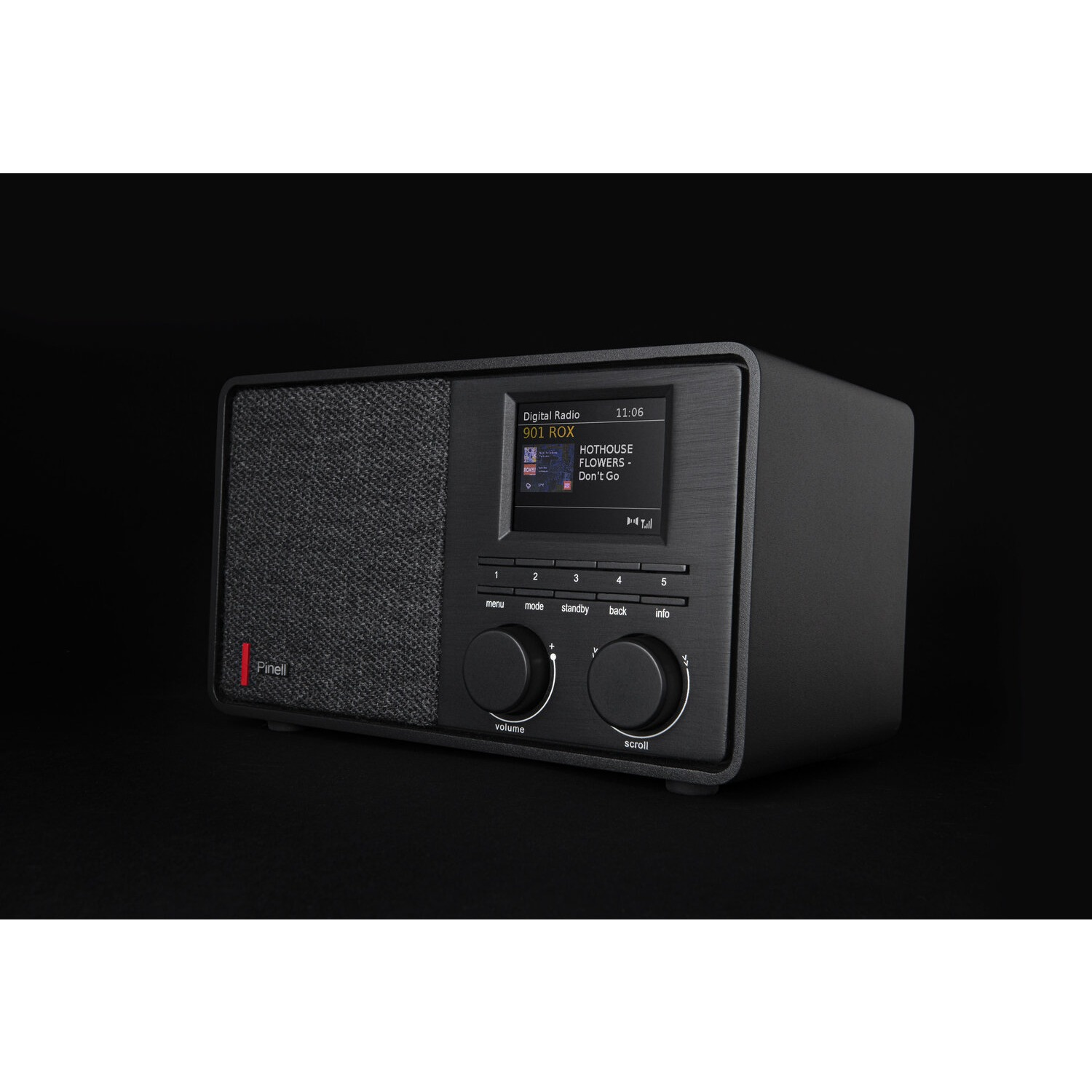 Black digital radio with display. Shows radio station info and controls for volume and tuning.