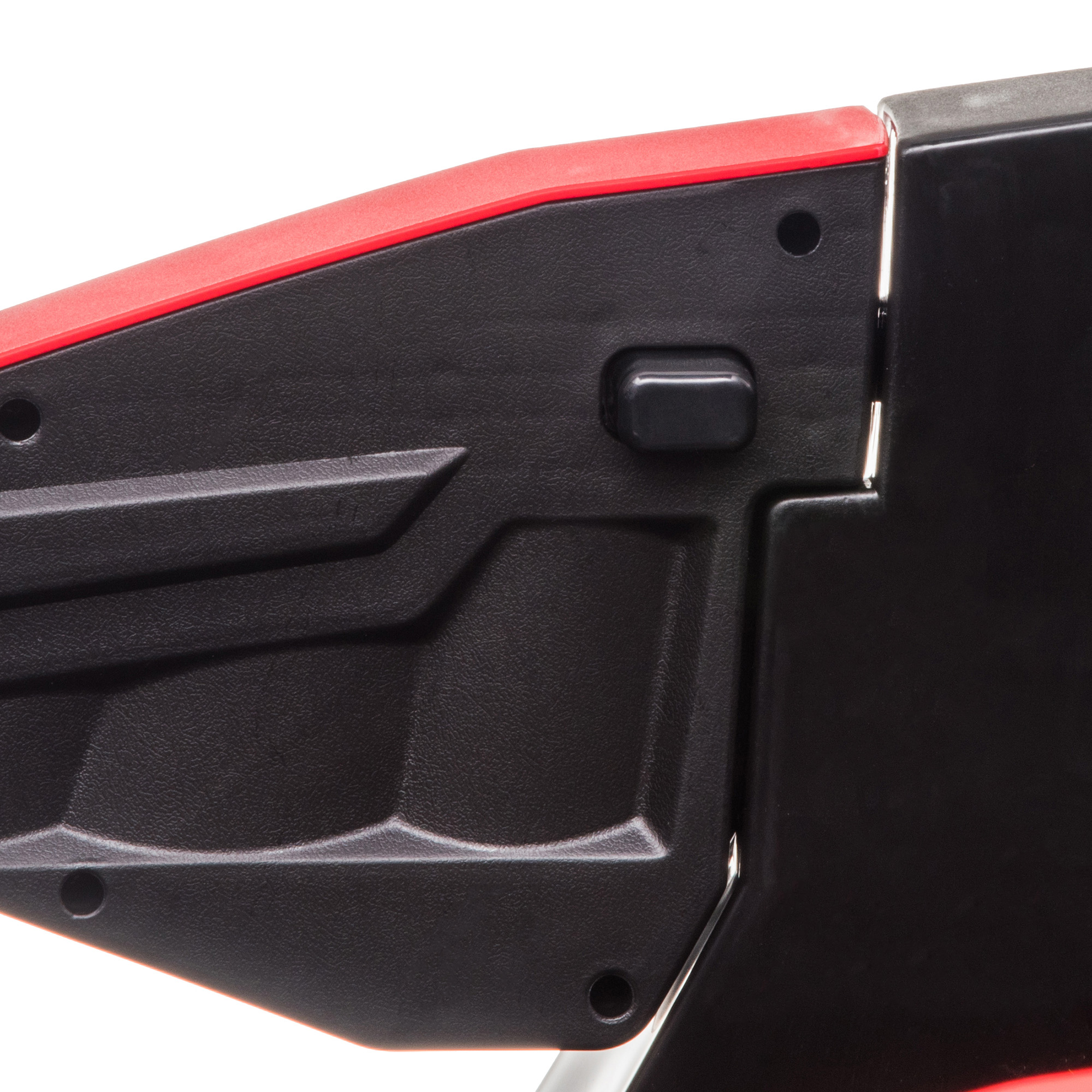 Un primo piano di parti in plastica nera e rossa, possibilmente da un giocattolo o un componente di una macchina.