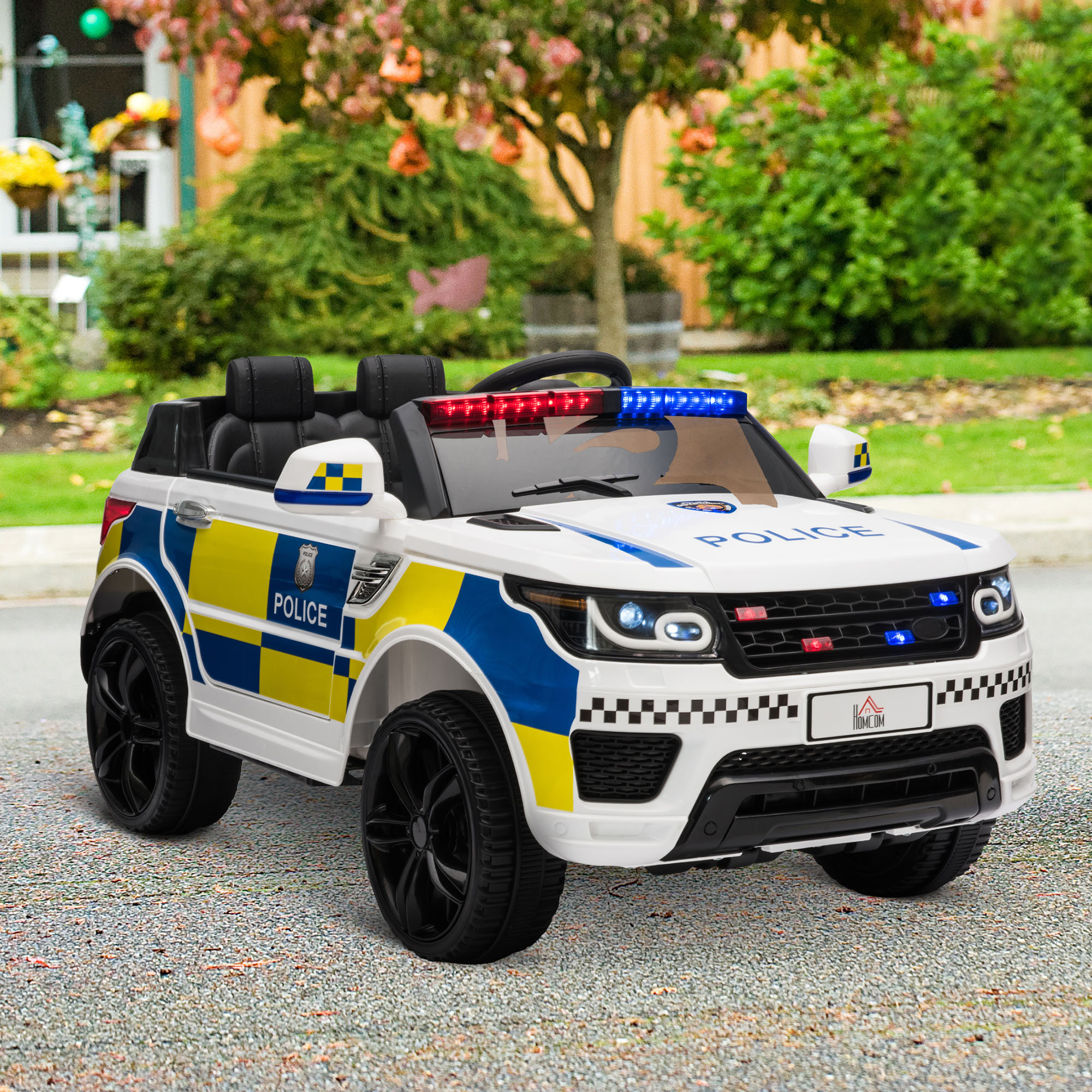 Un'auto giocattolo bianca a tema polizia. Ha un design blu e giallo e luci lampeggianti.