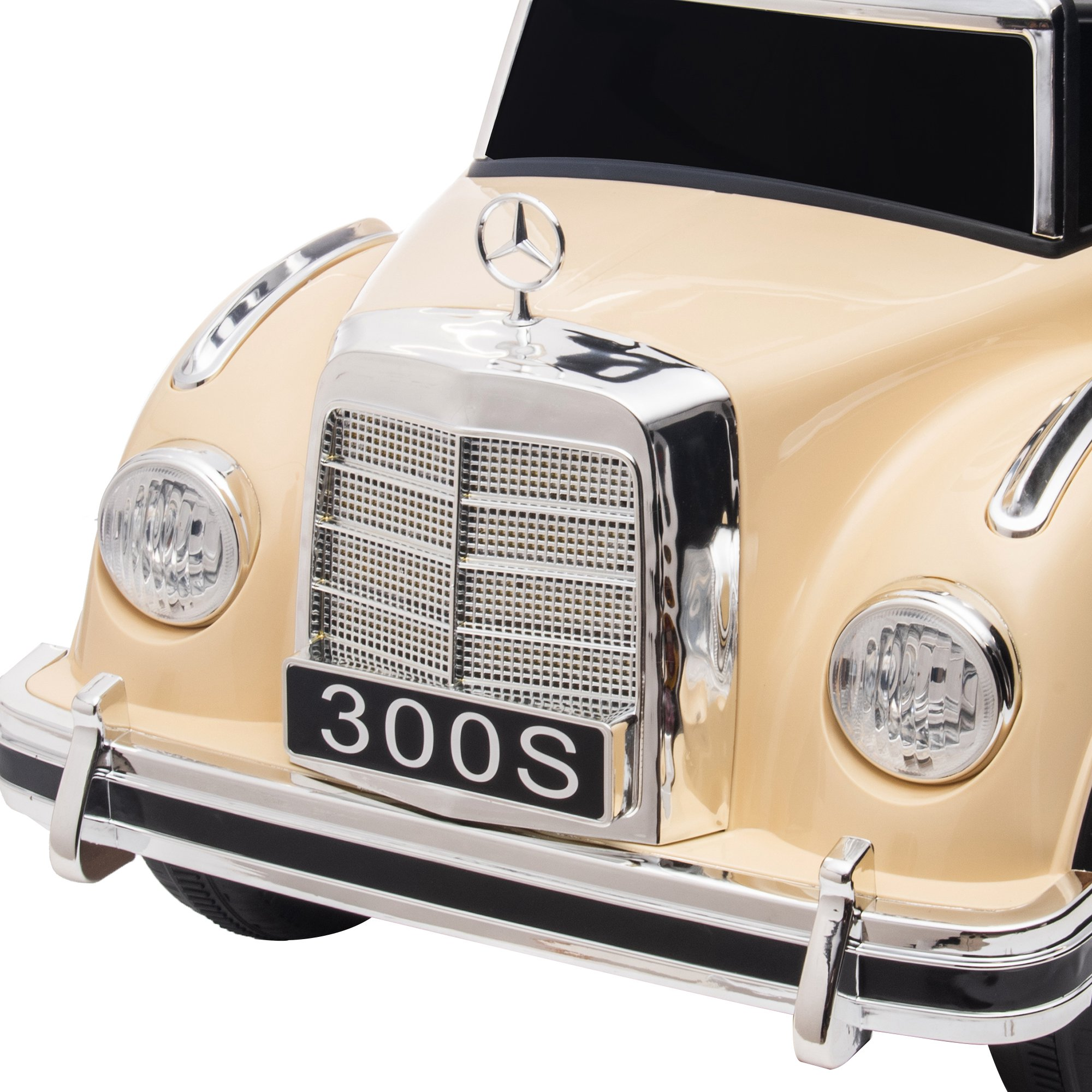 Parte anteriore di un'auto classica beige. Griglia cromata, targa 300S, fari ed emblema Mercedes-Benz.