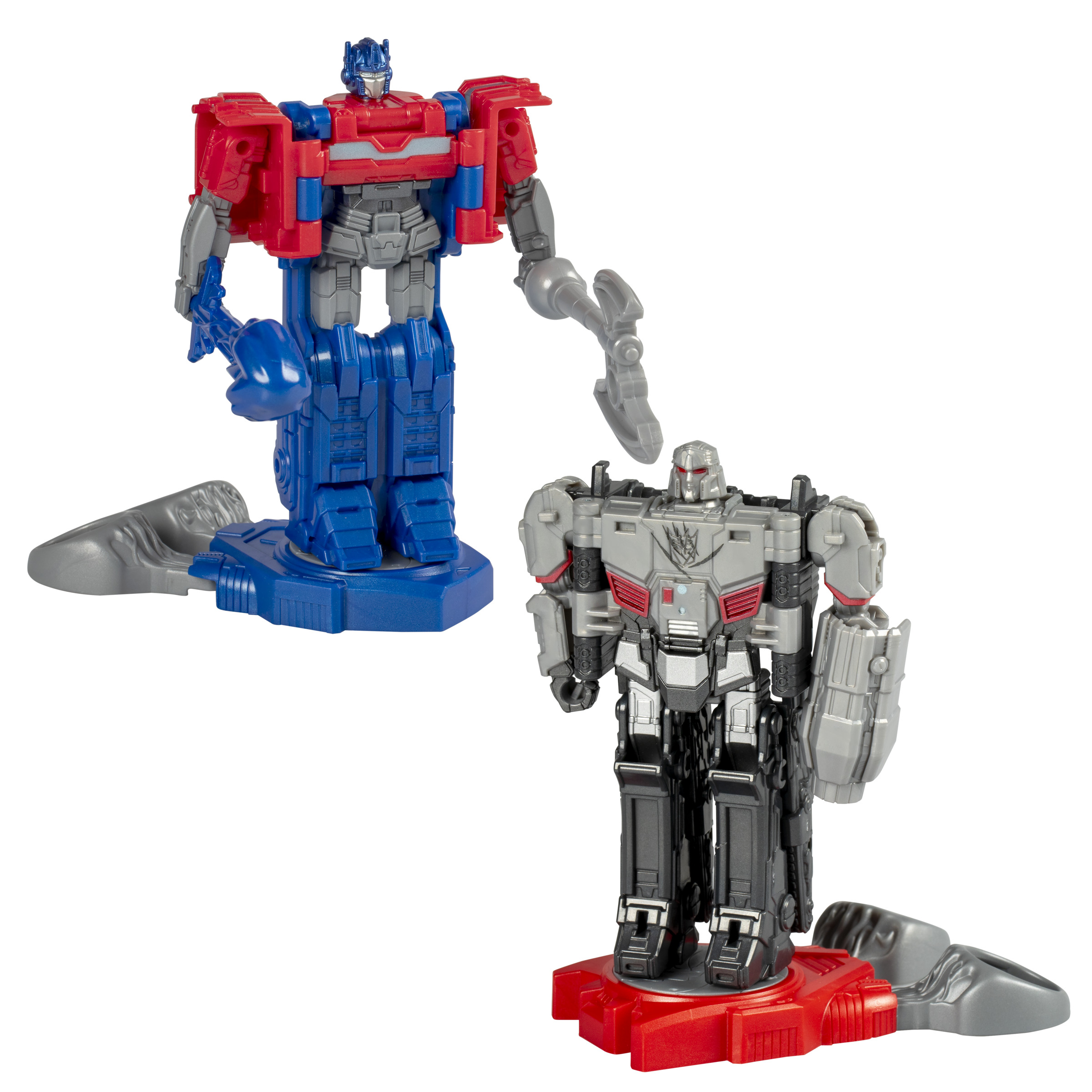 Dos juguetes Transformers, Optimus Prime y Megatron, sobre bases. Ambos están en modo robot.