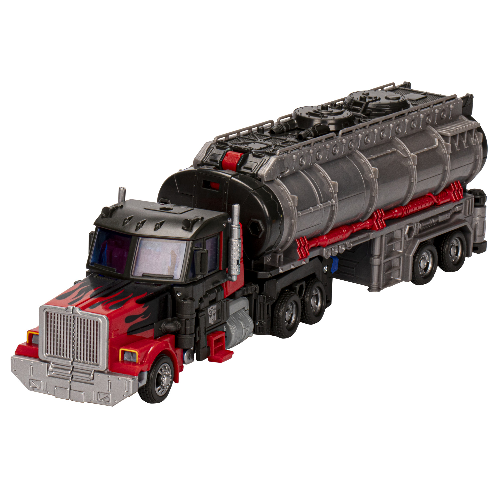 Camión Transformer de juguete, negro con llamas rojas. El remolque cisterna es gris y negro.