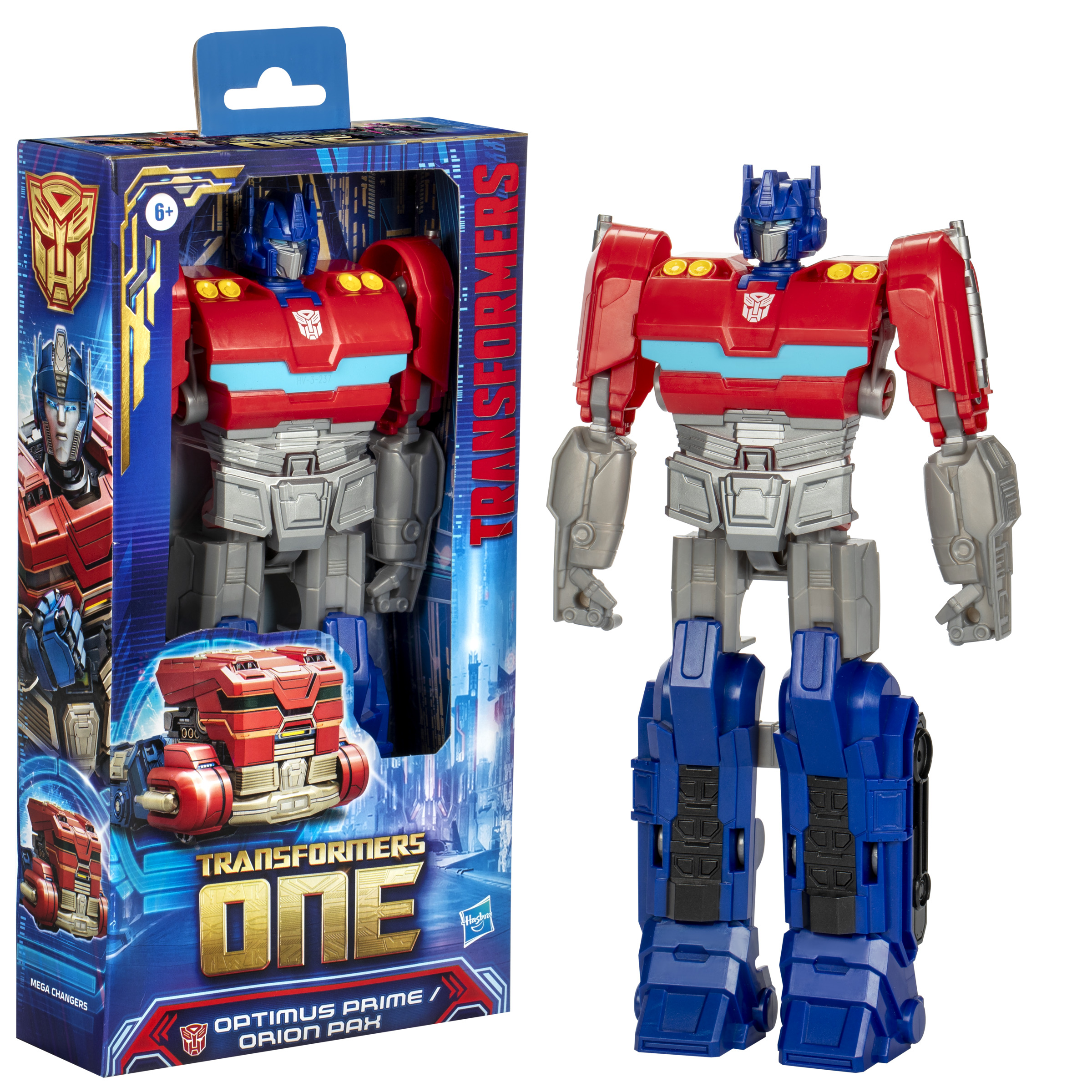 Figura giocattolo di Optimus Prime nella scatola, colori rosso e blu. La figura è accanto alla scatola.